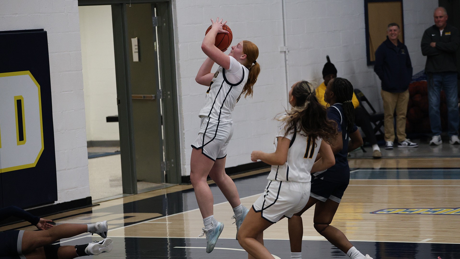 Cami Dalinghaus finishes a fast-break layup against Metropolitan Community College-Kansas City
