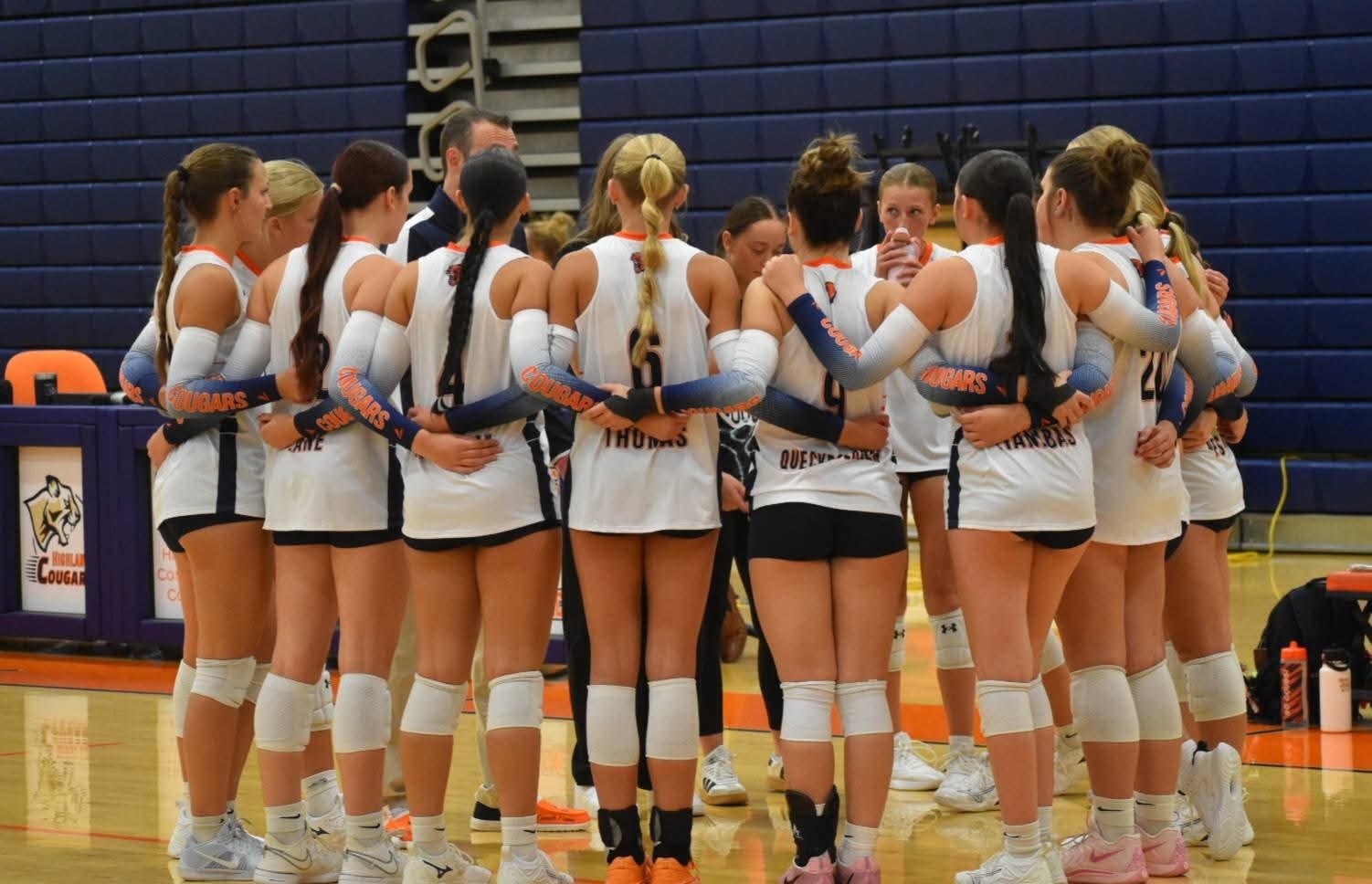 Volleyball Team Huddle