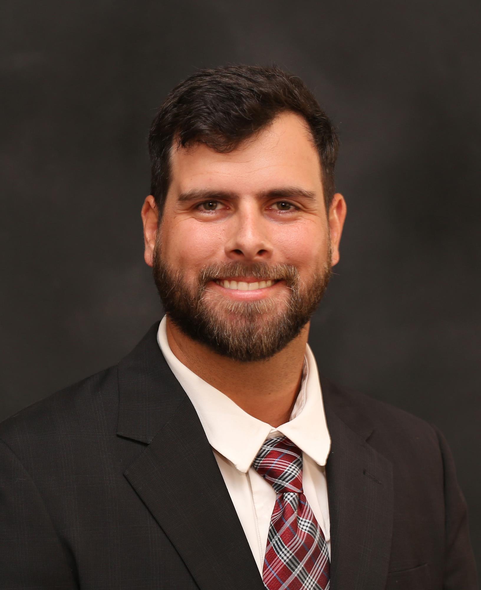 Headshot of Hinds CC Assistant Athletic Director Andrew Gunn