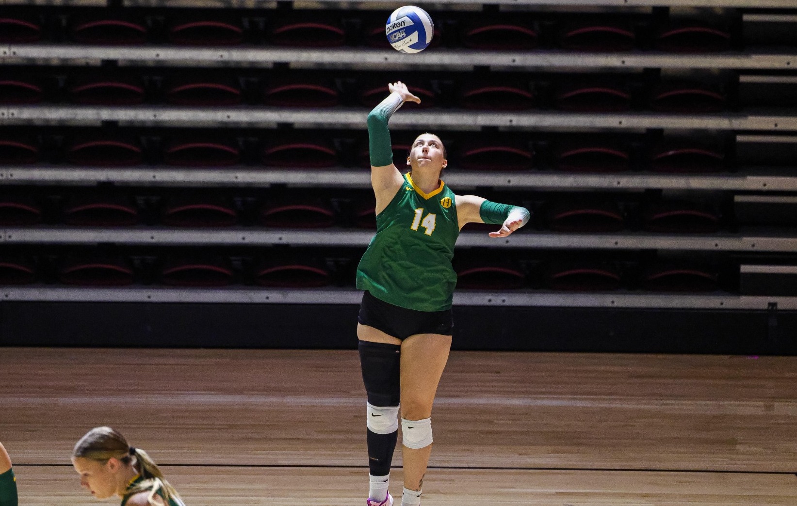 Cassidy Henderson with a service ace