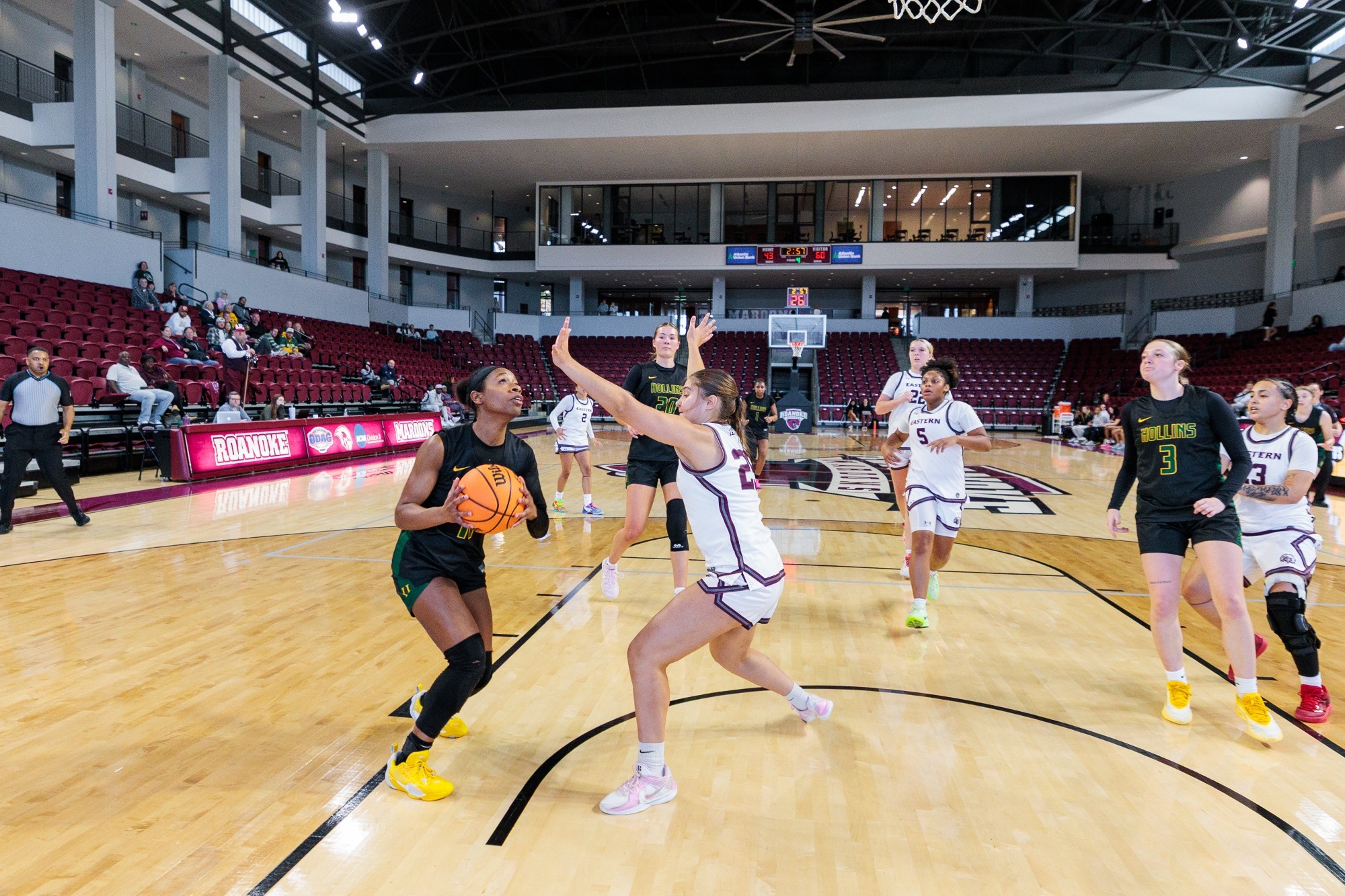 Noelani Carter with a layup against a defender
