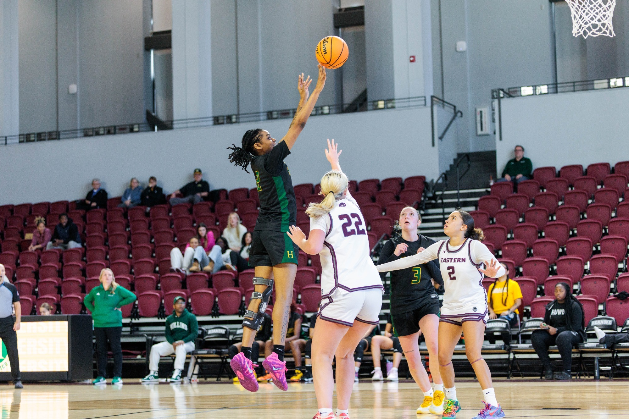 Jacorra Russell with a jumper over a defender