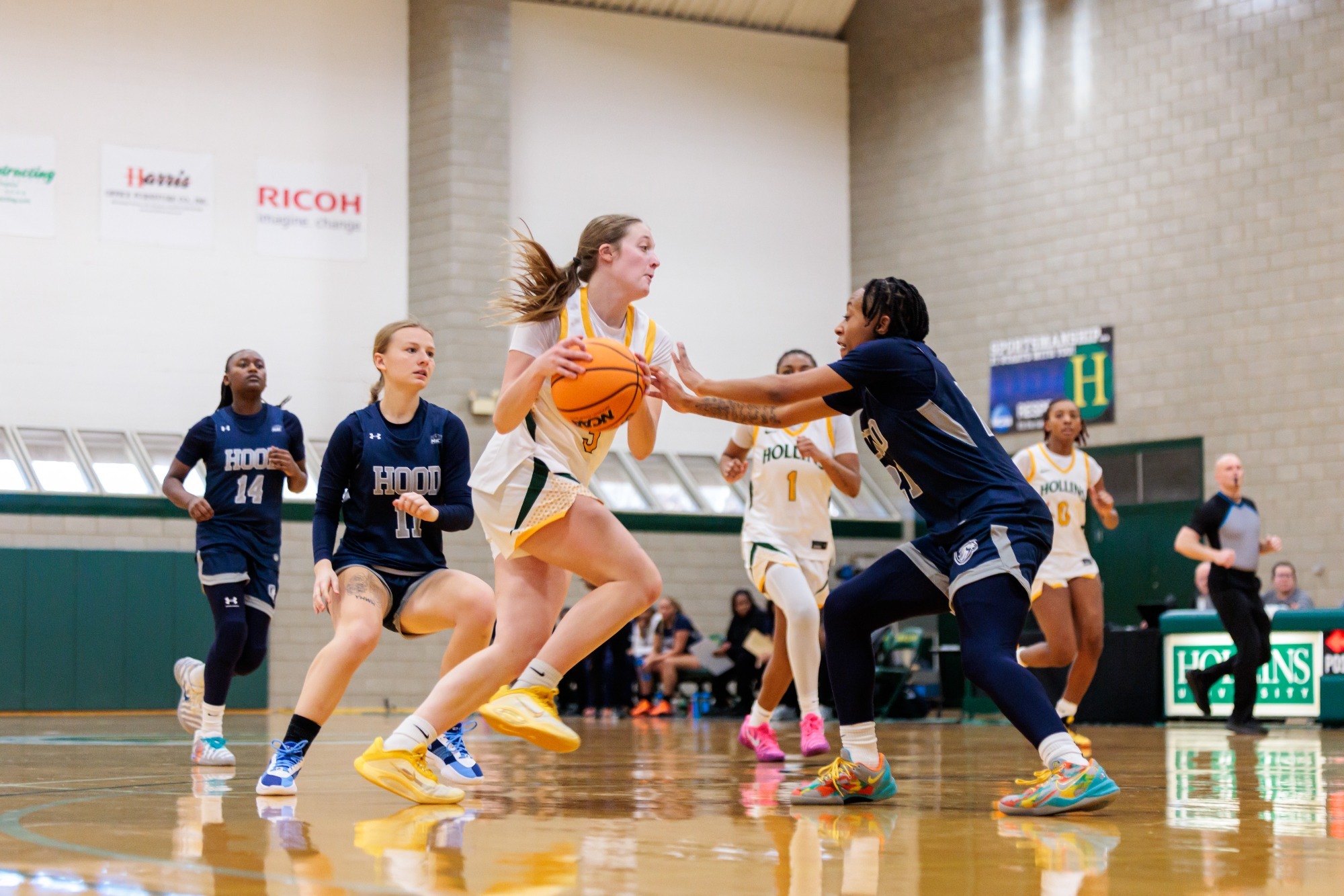 Abby Kingery with a driving layup attempt