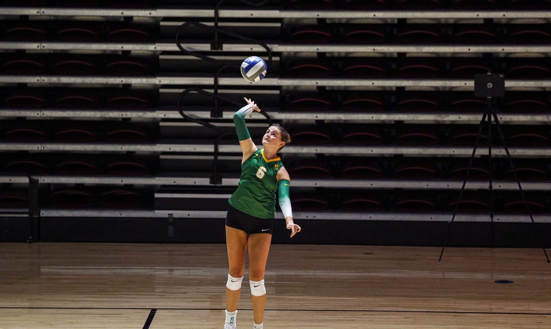 Norah Madrey with a serve