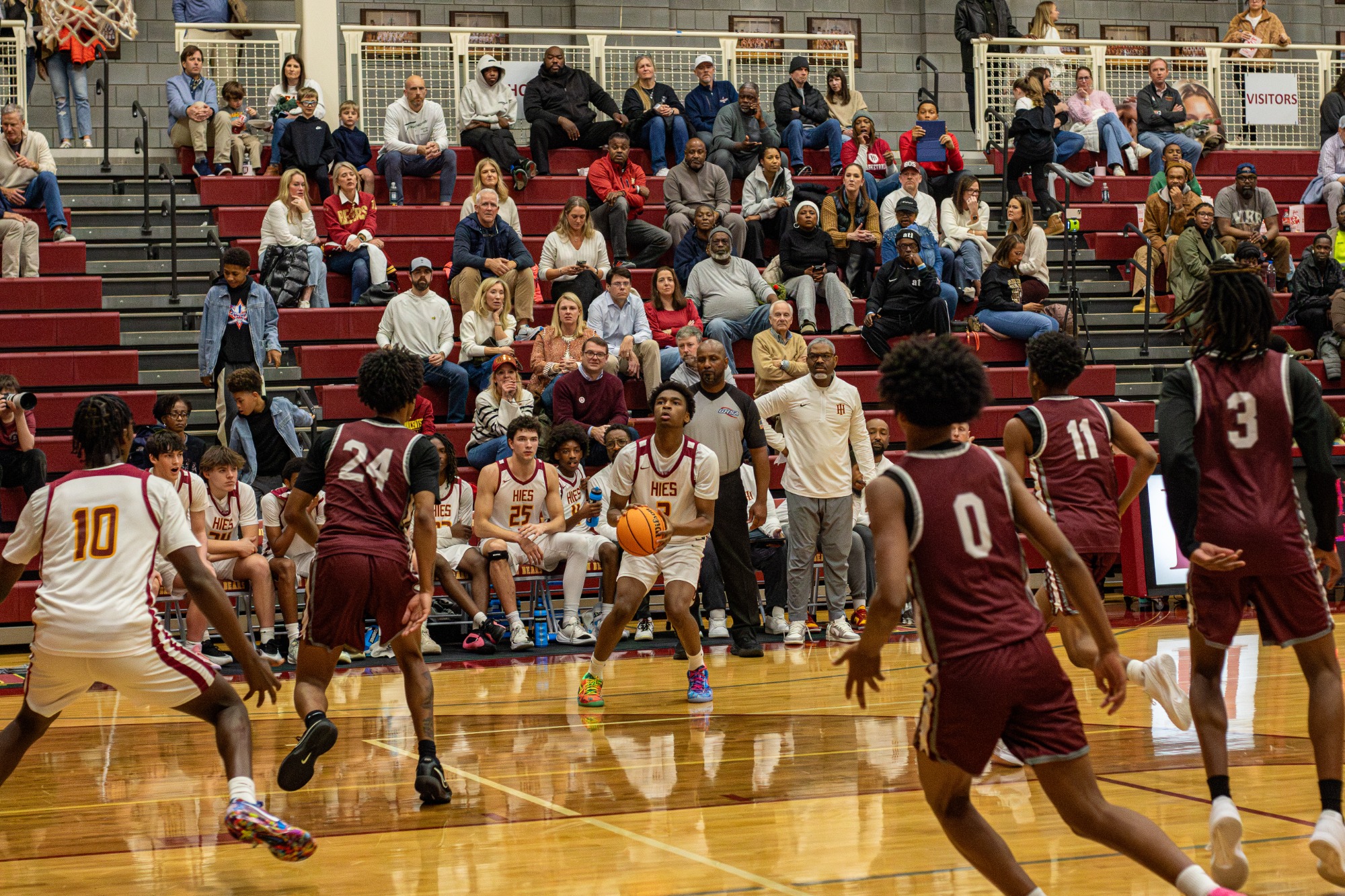 HIES boys basketball players compete against Carver during Winterfest 2026.
