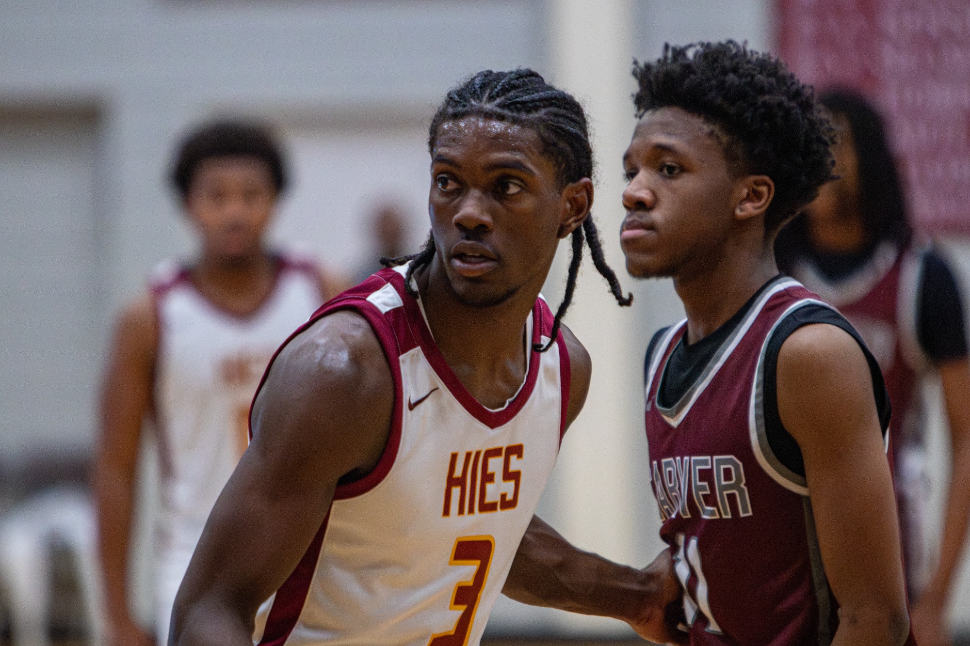 HIES boys basketball players compete against Carver during Winterfest 2026.