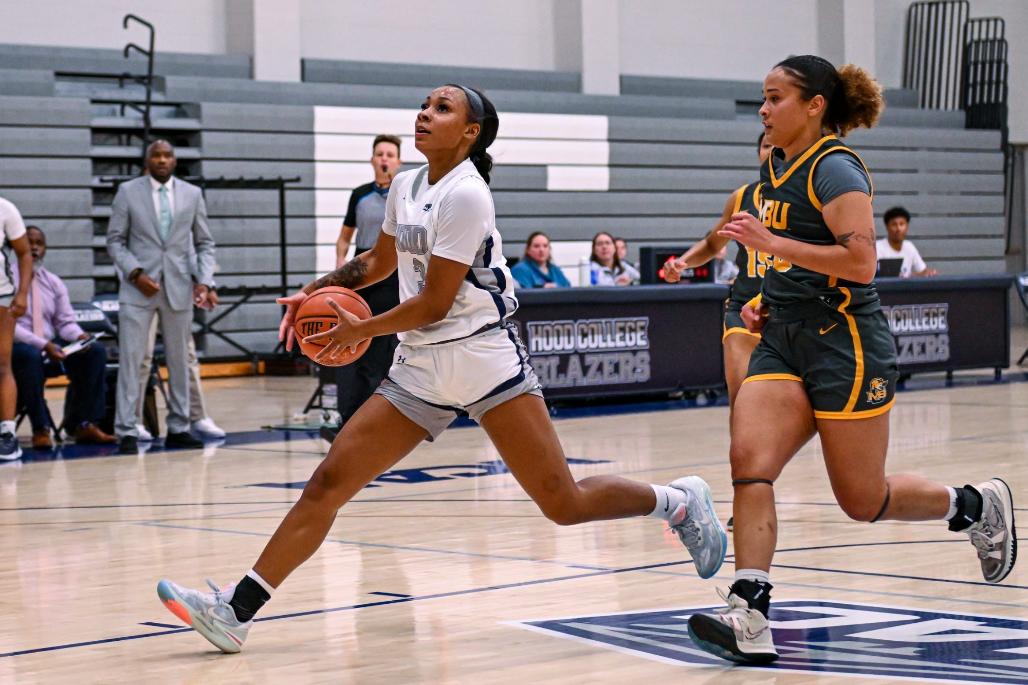 Women's basketball glides by Eagles Hood College