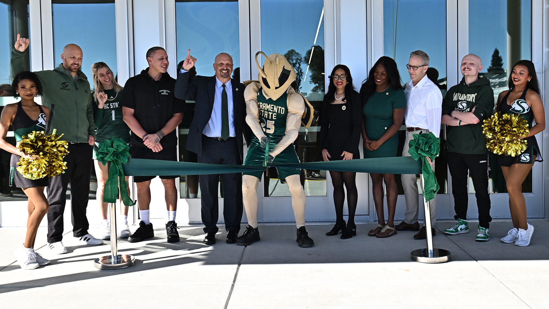 2025-26 ATH University leaders were joined by head women’s basketball coach Aaron Kallhoff, head men’s basketball coach Mike Bibby, Athletic Director Mark Orr, and members of the spirit squad to cut the ribbon officially opening Hornet Pavilion at The WELL