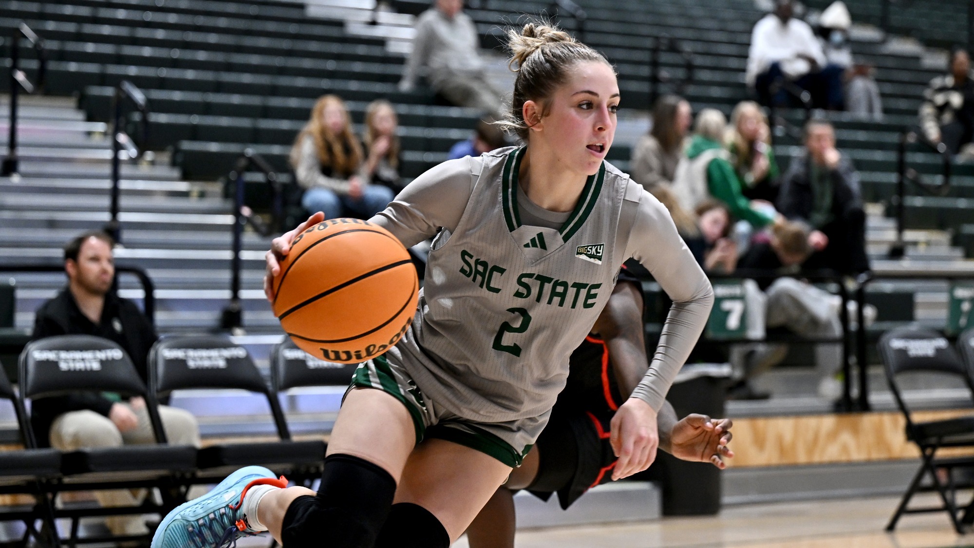 2025-26 WBB Natalie Picton drives past a defender against Simpson University