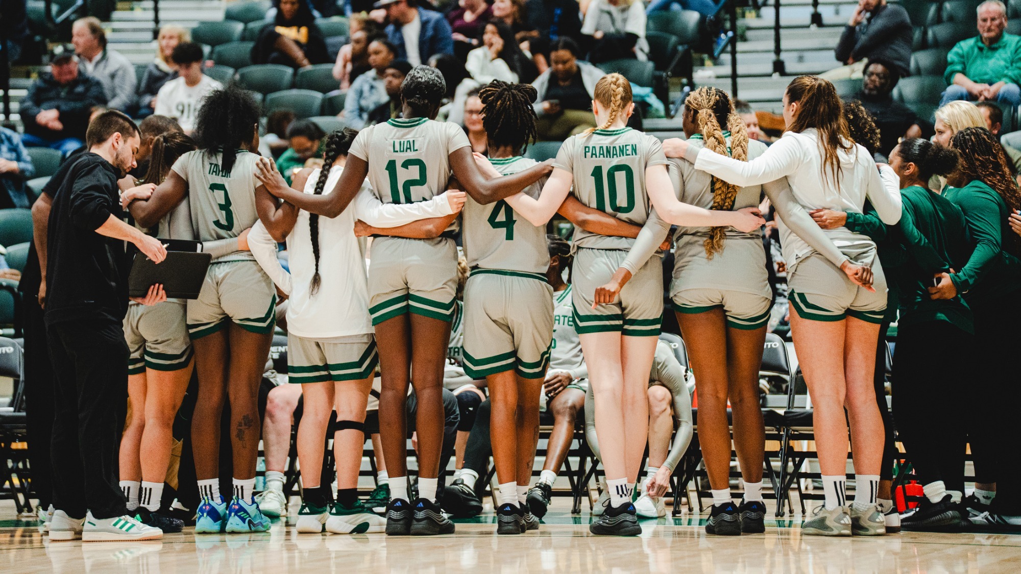 2025-26 WBB Team huddle during a time out against Cal State Fullerton