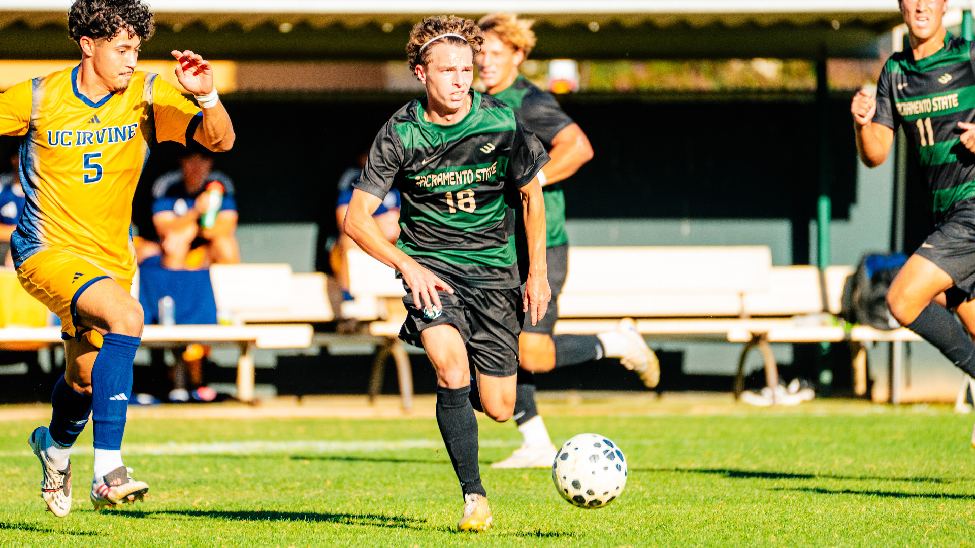 2026 MSOC Zach Looney dribbles past a UC Irvine defender in a match at home earlier this year