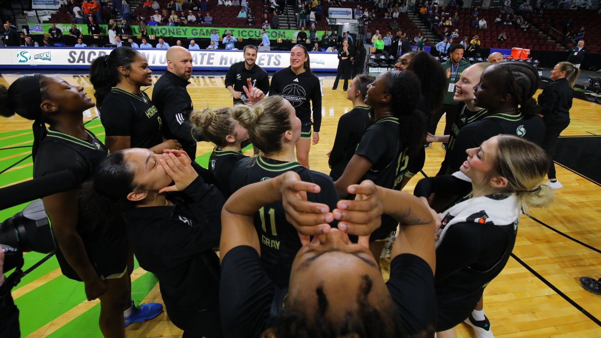 2025-26 WBB team celebration at midcourt following a quarterfinal tournament win over Idaho State at the Big Sky Tournament in Boise, Idaho