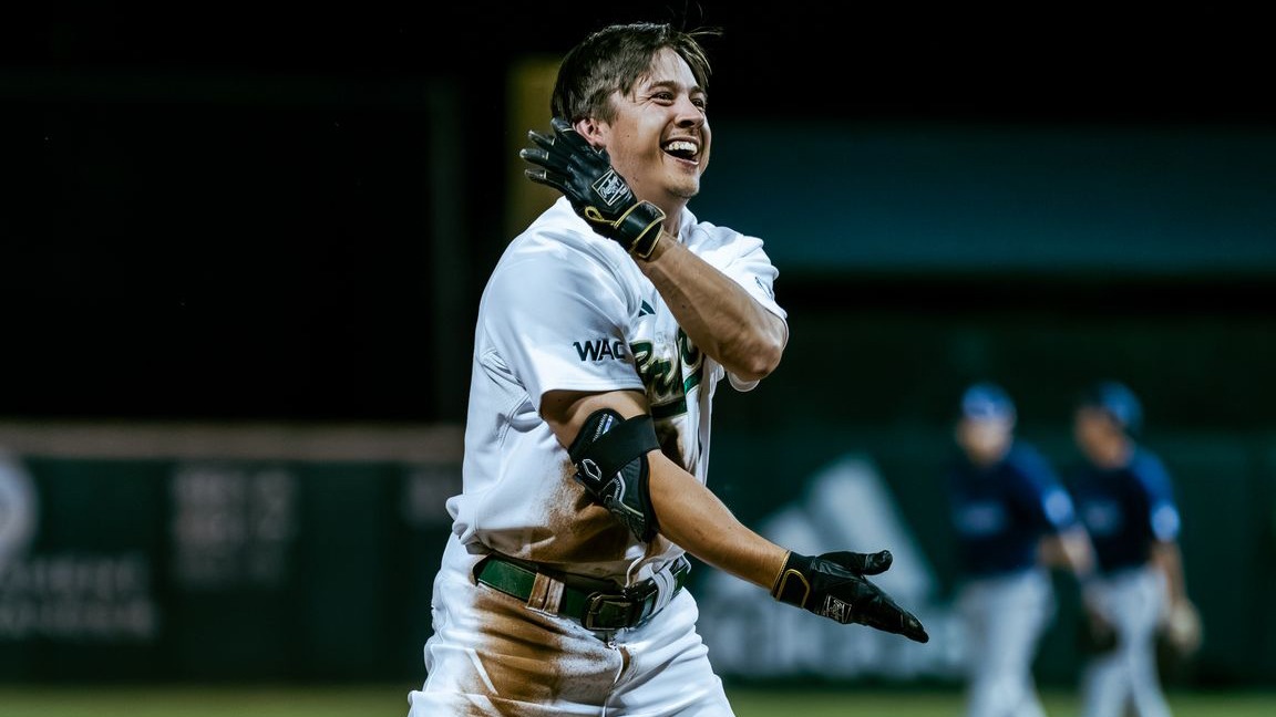 2026 BSB Senior Ryan Ellis celebrates after hitting a triple at home at Nevada on April 6