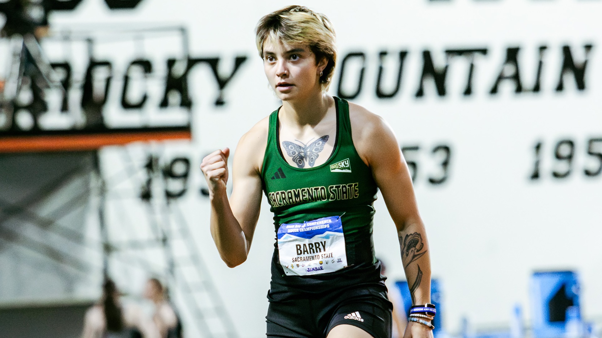 Jessi Barry pumps her fist after a high jump at the 2026 Big Sky Indoor Championships