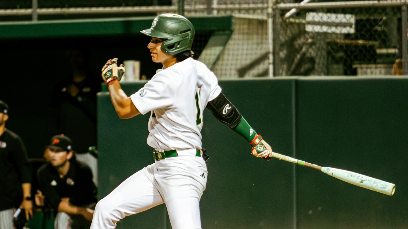 2026 BSB Erick Dessens swings at a pitch during a game against Pacific on March 11 at home