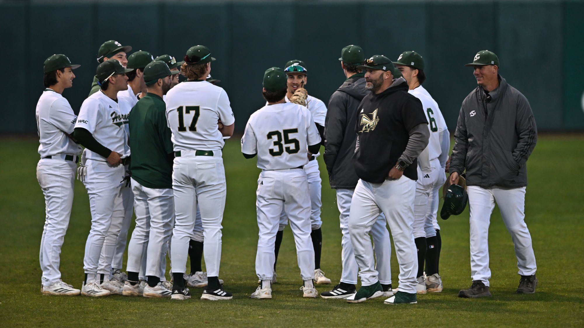 2026 BSB Pregame huddle in the outfield prior to a Feb. 20 game against Saint Joseph's