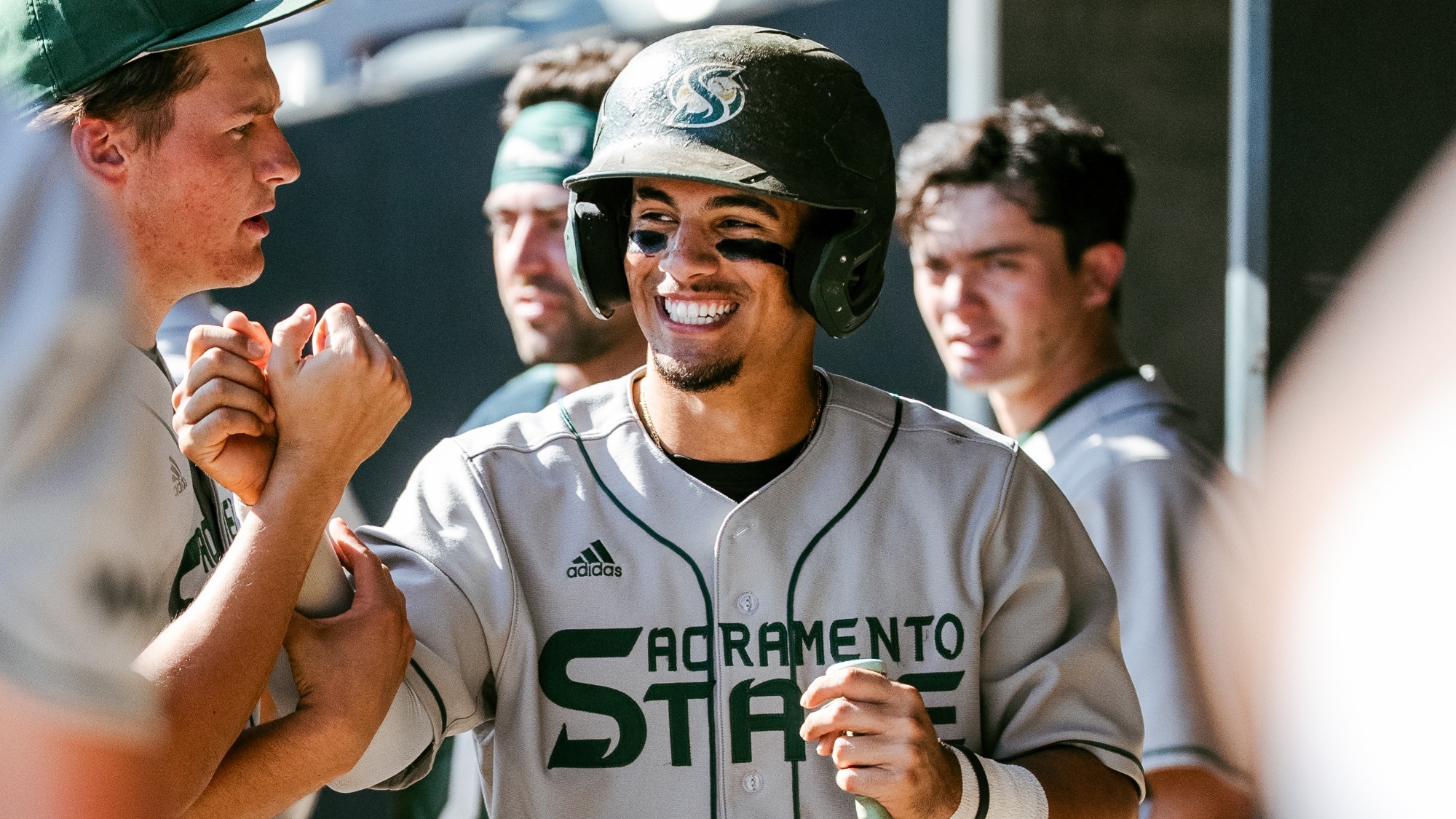 2026 BSB Luis Pimentel-Guerrero is congratulated by his teammates as he returns to the dugout in a game at Pacific earlier this year