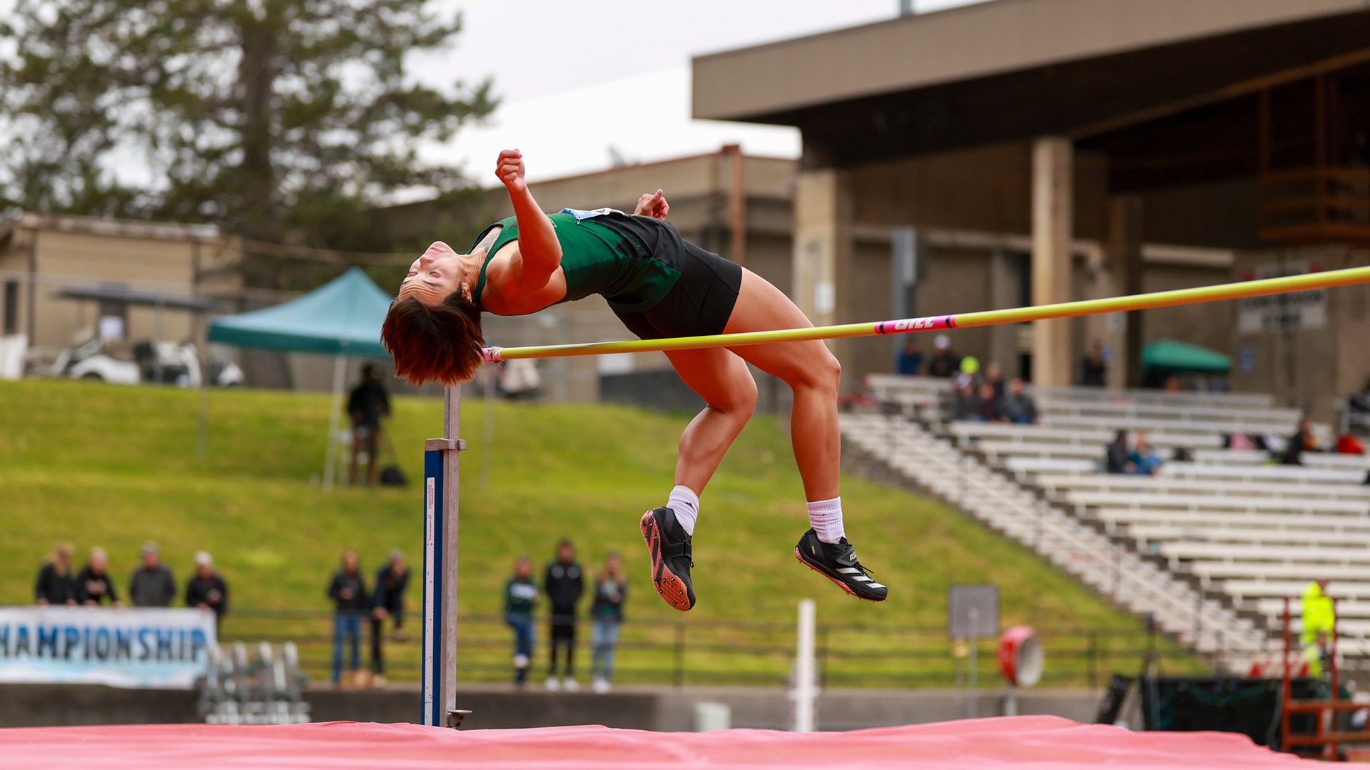 Jessi Barry clears the high jump bar