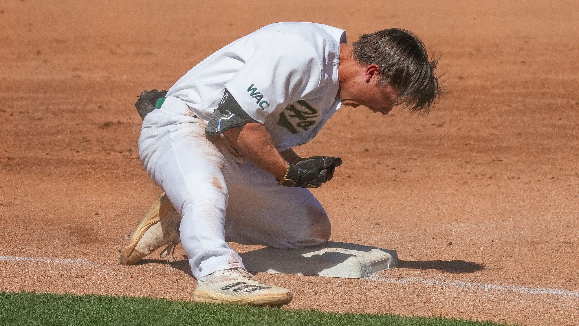 2026 BSB Ryan Ellis celebrates on third base following his triple against Tarleton State in the WAC Tournament Championship game on May 23