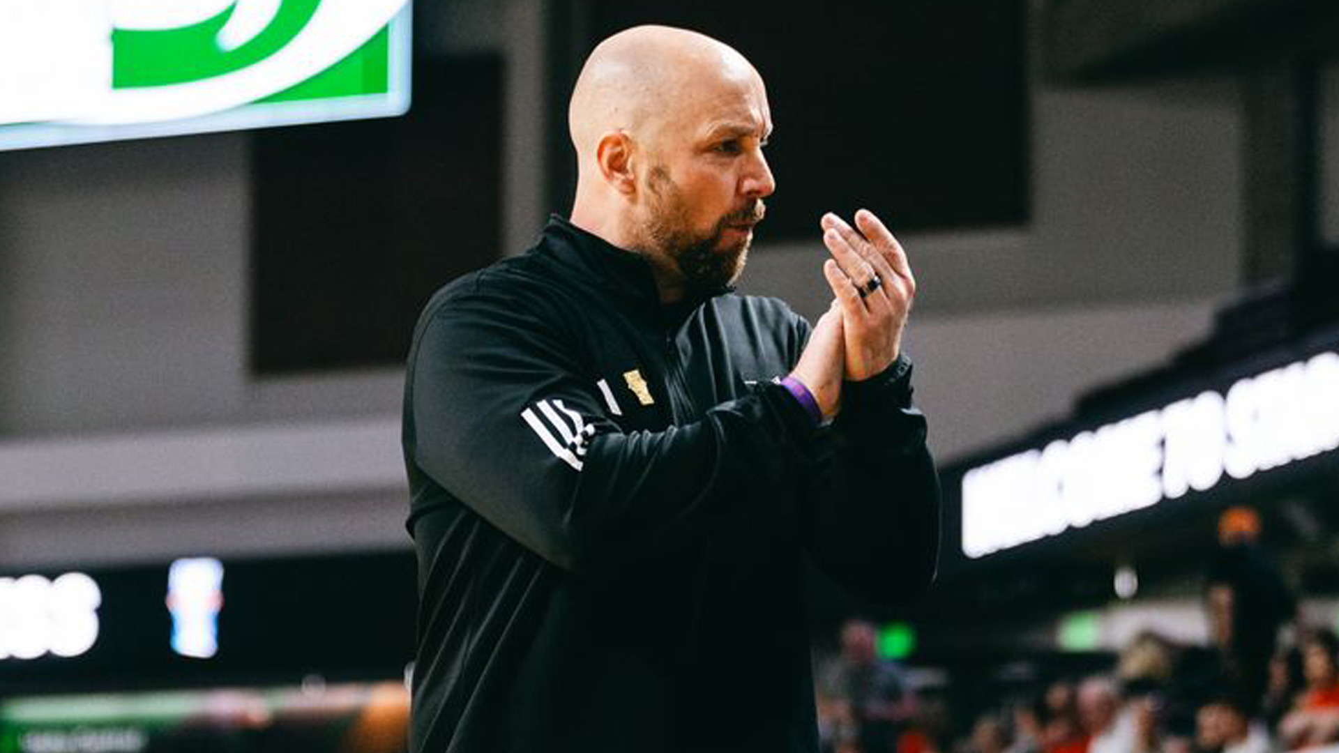 2025-26 WBB Head Coach Aaron Kallhoff claps during a game against Idaho State at the Big Sky Conference Tournament