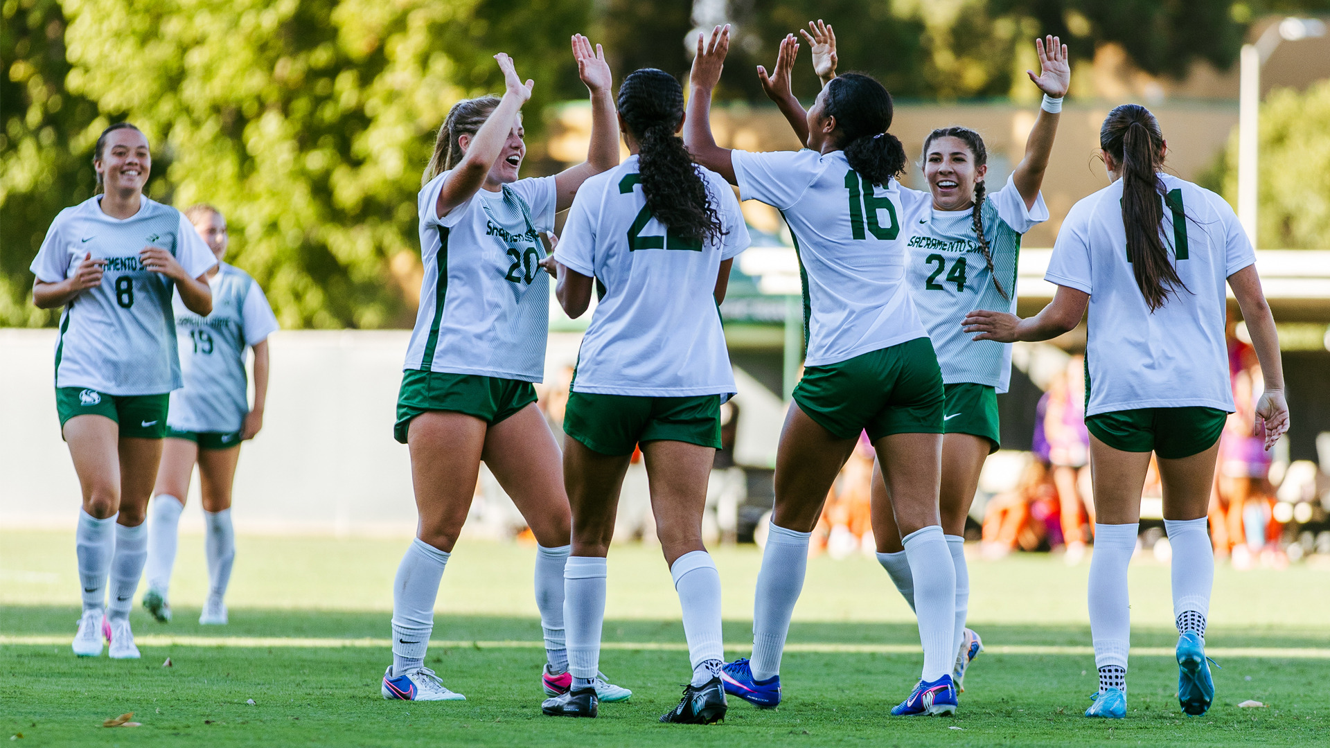 2026 WSOC Mia Jackson celebrates with her teammates following one of her two goals on the day against Pacific