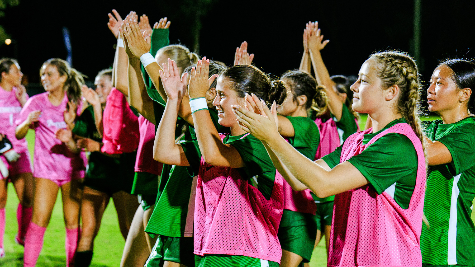 2026 WSOC Hornet players clapping to acknowledge the fans in attendance following a win at UC Davis