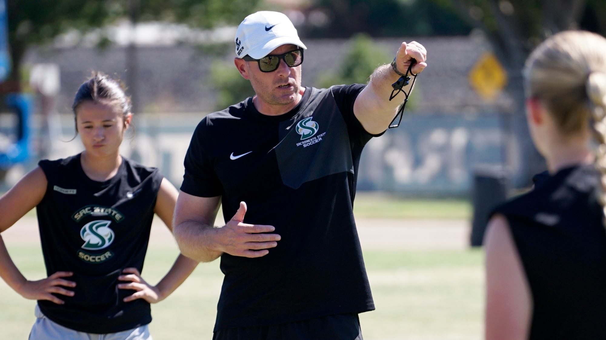 2026 WSOC Head Coach Tim Strader addresses the team following a preseason training session