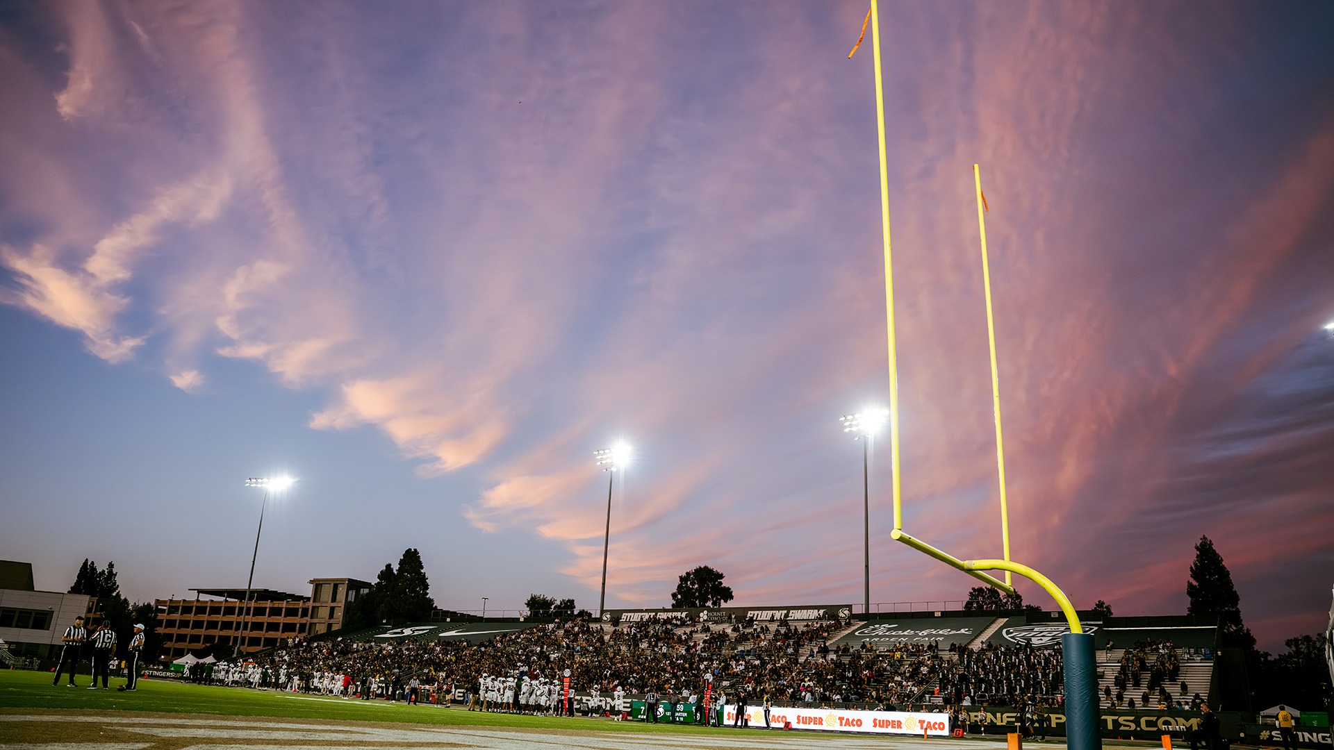 Wide photo of the east grandstand at sunset