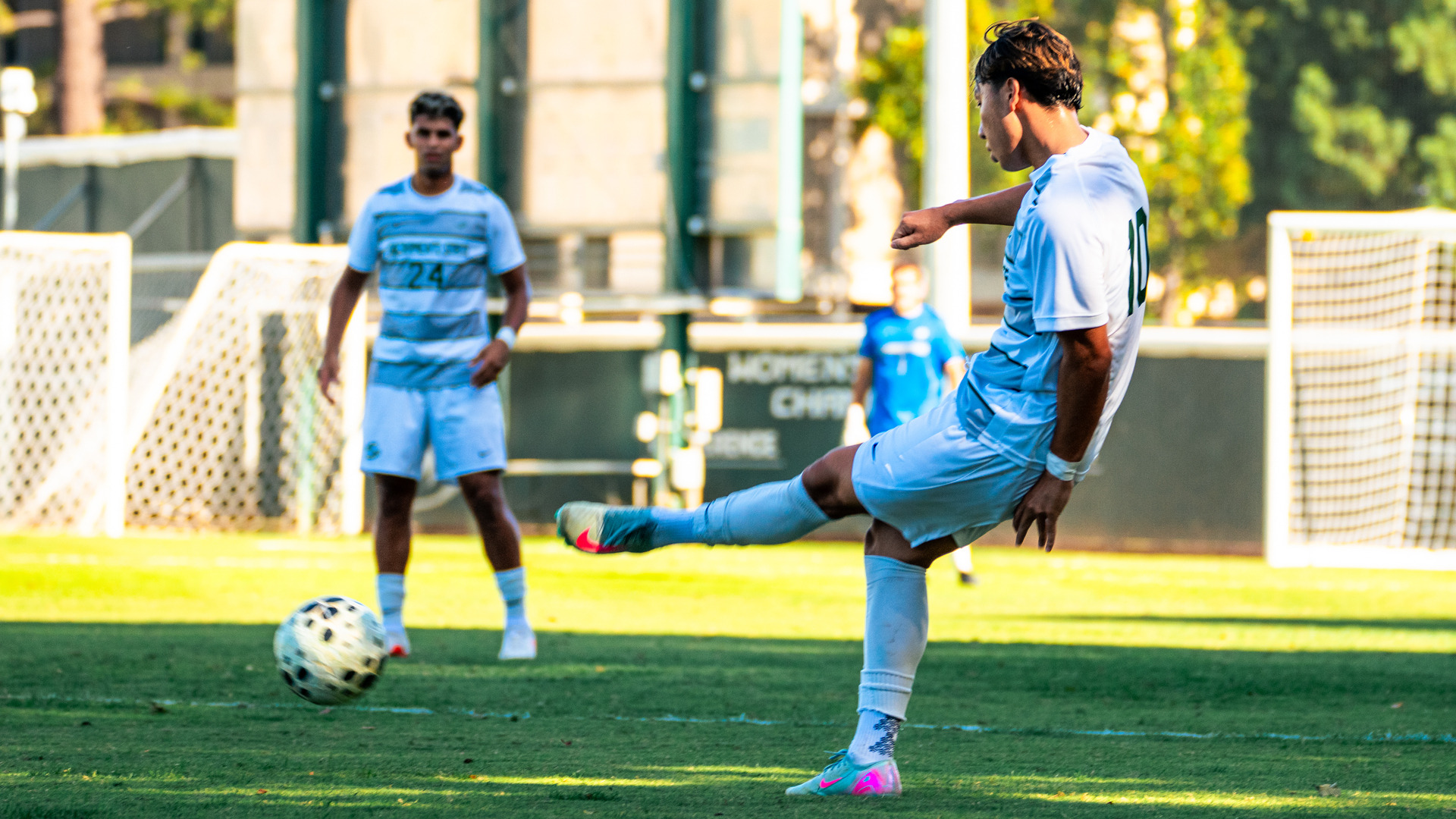 2026 MSOC Hiroshi Yang sends a pass across the field against Pacific