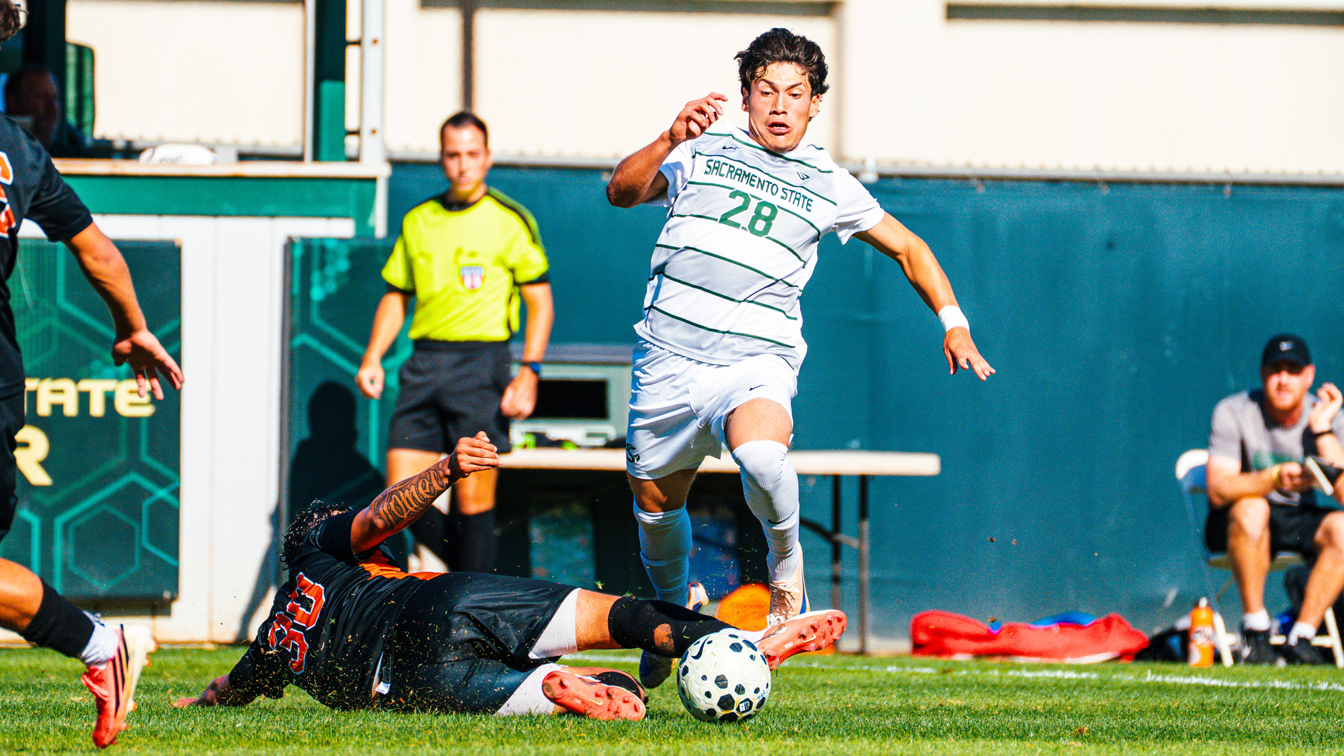 2026 MSOC Jesus Magana leaps over a Pacific defender in pursuit of the ball during a recent home match