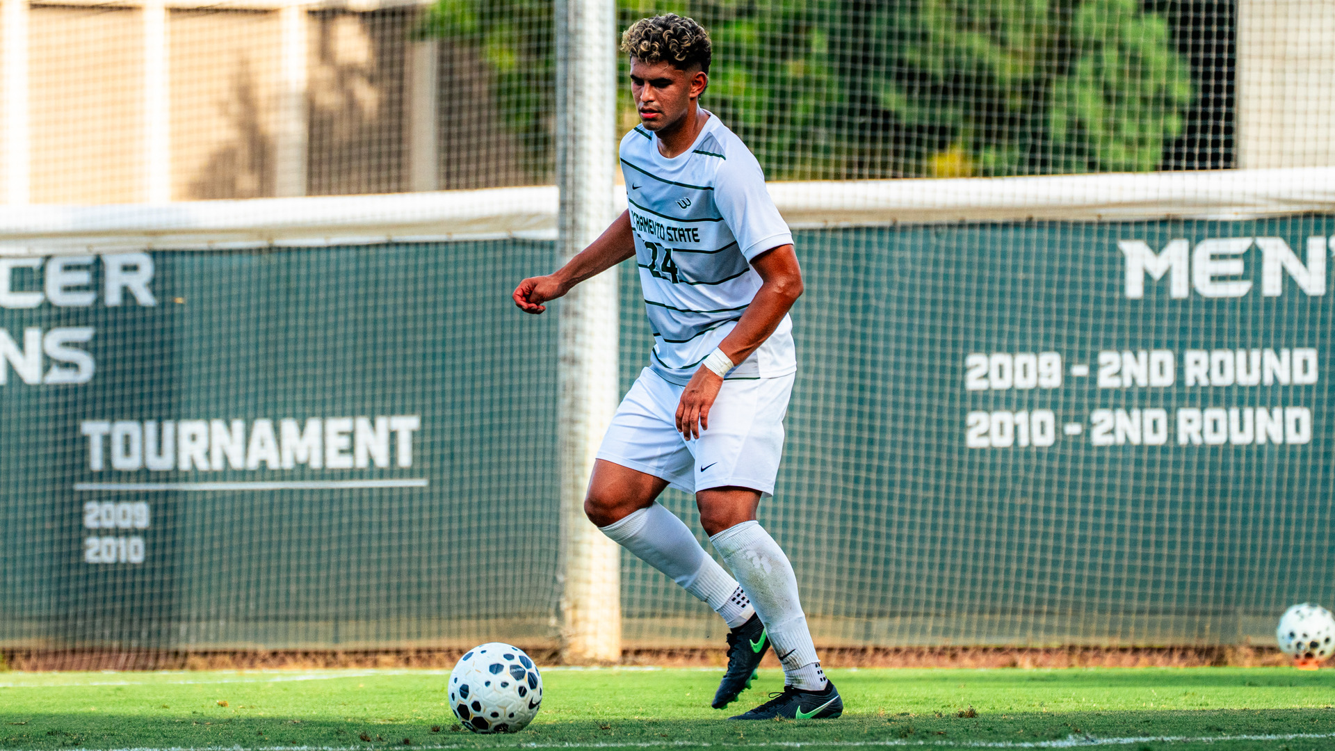 2026 MSOC Angad Singh dribbles the ball in a match against UC Davis