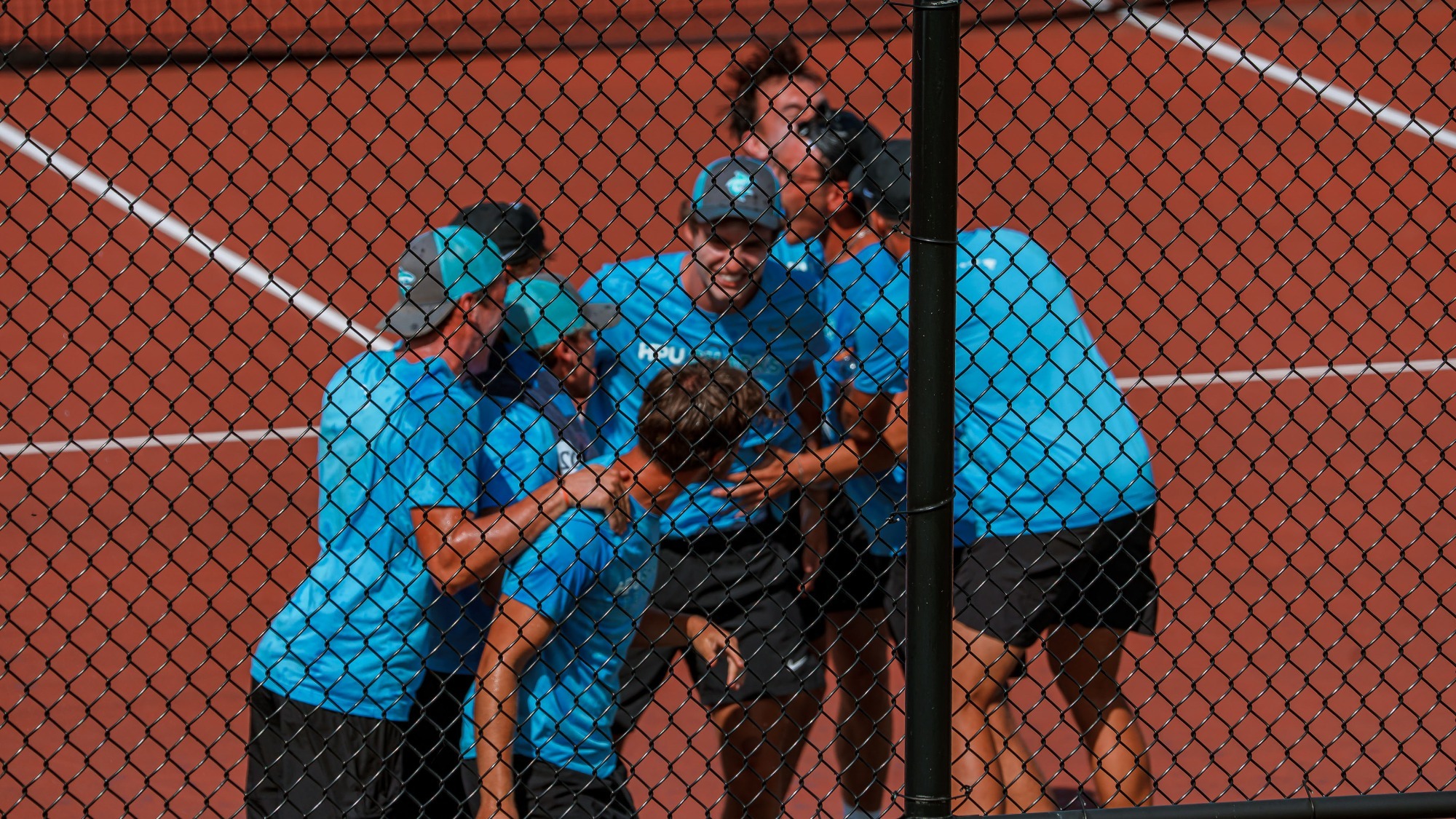 Men's Tennis Celebrates Tight Win