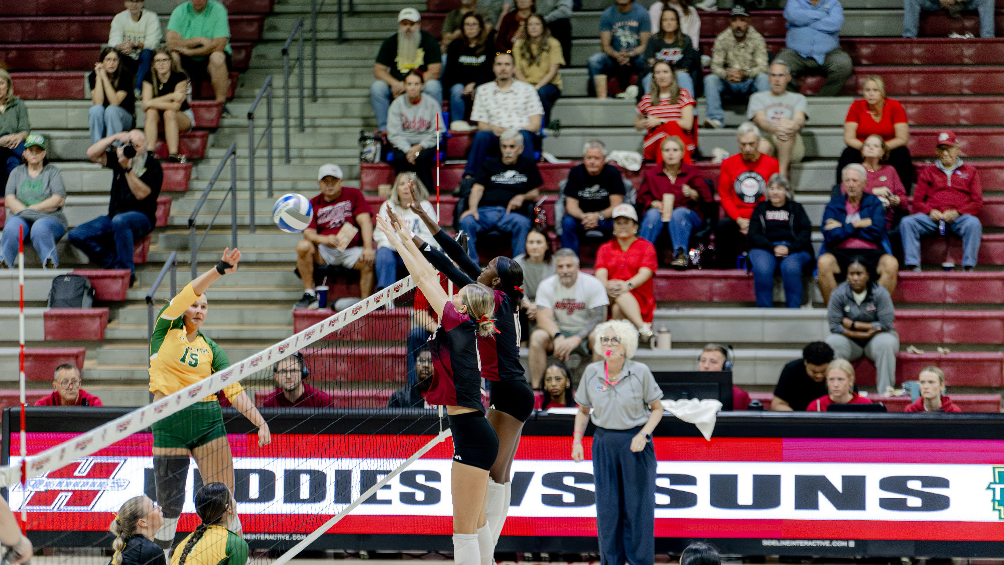 Lasheena Gooseberry and Karsen Hart Jump for a Block