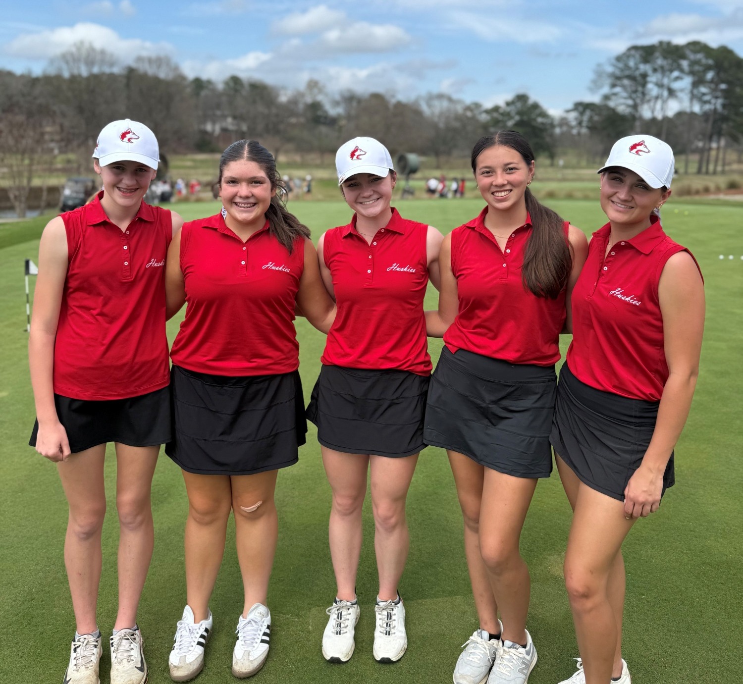 four girls golfers 