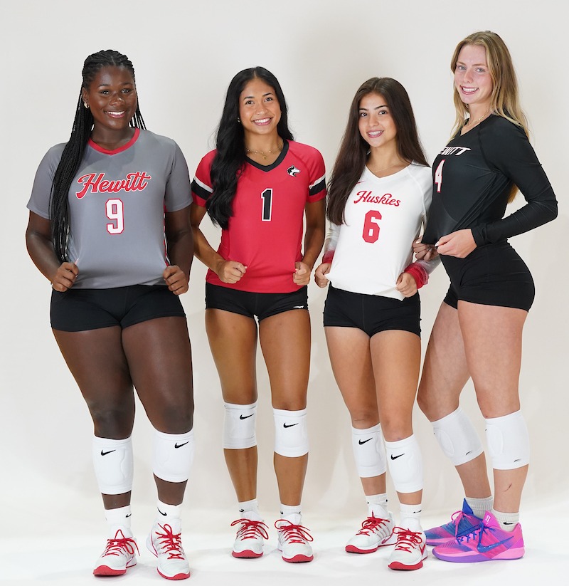 Four volleyball players