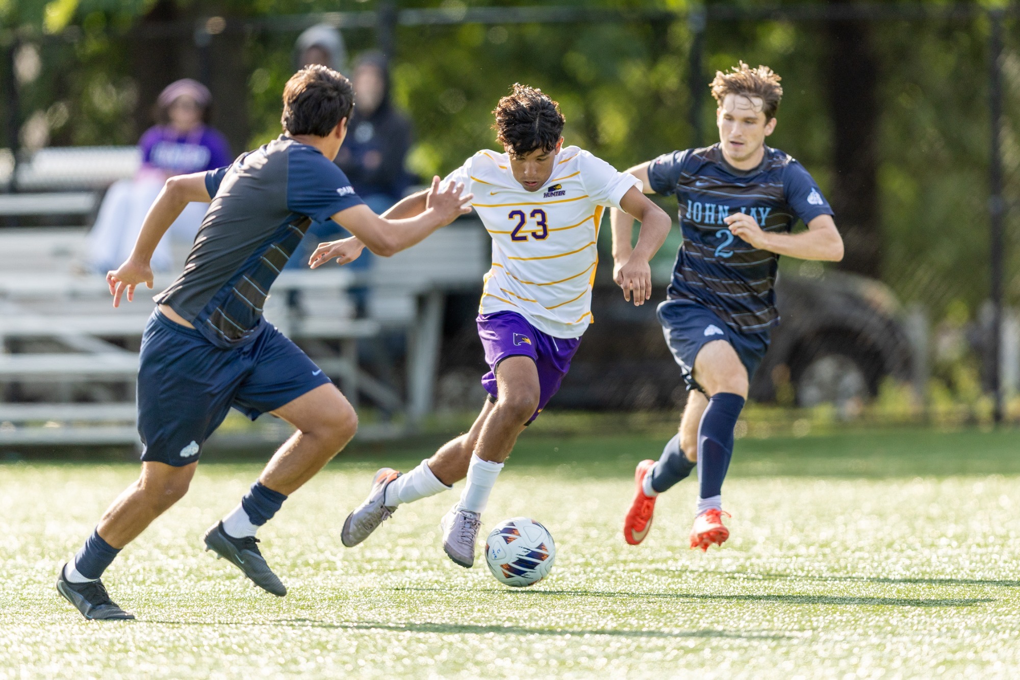 Luciano Aguirre competes for Hunter men's soccer