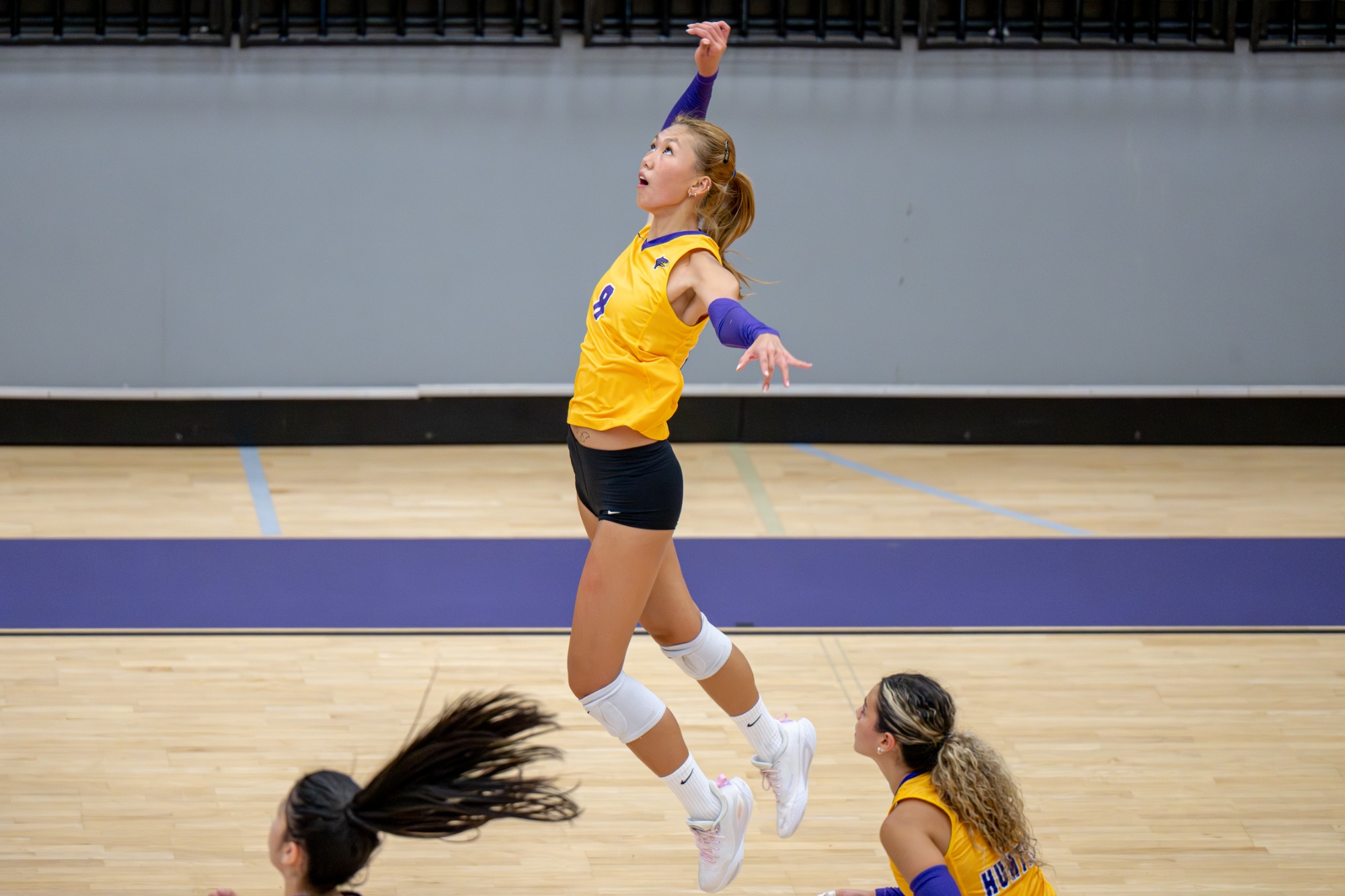Michelle Liu competes for Hunter women's volleyball