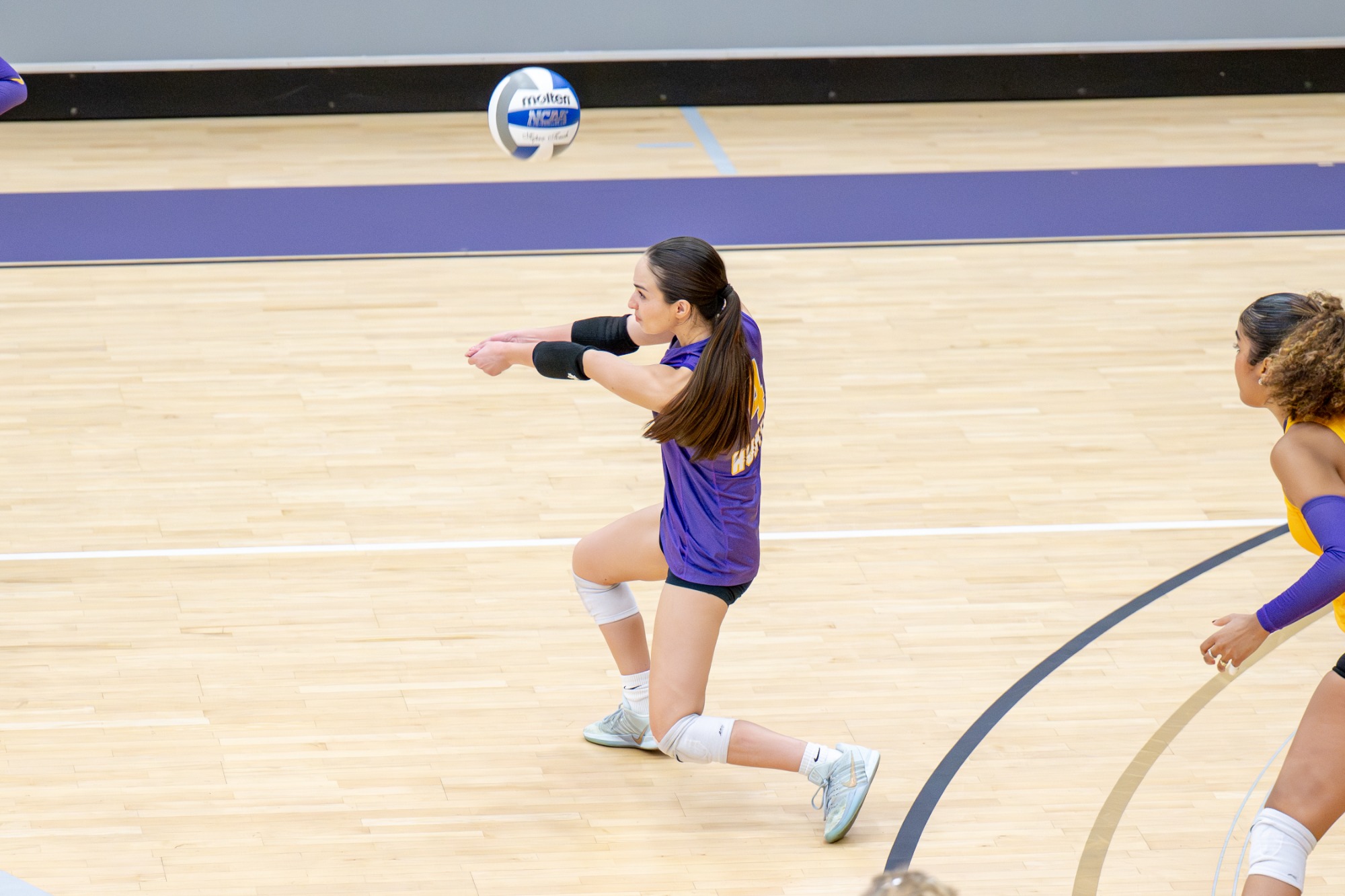 Natalie Morrill competes for Hunter women's volleyball