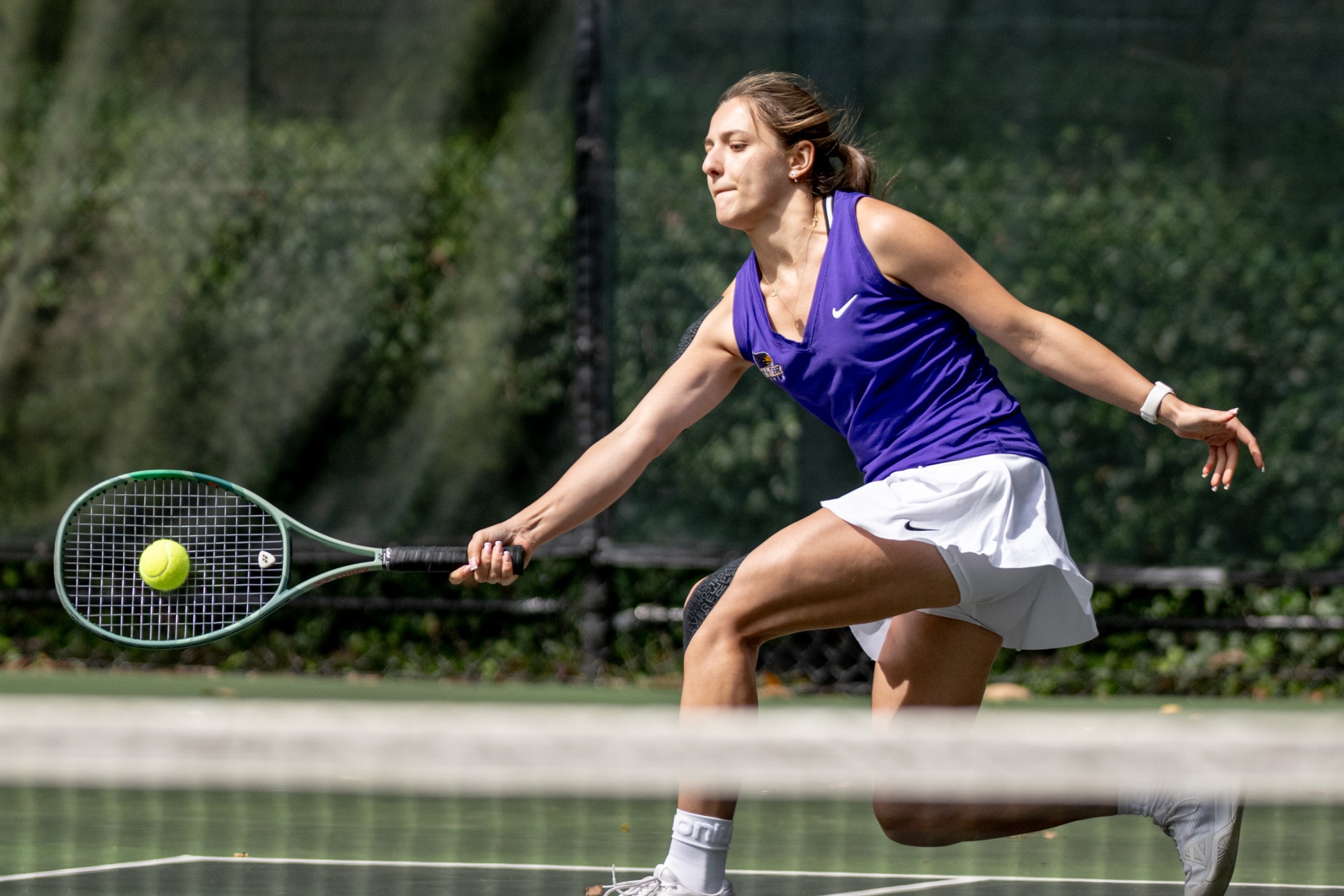 Apollinariia Stepanenko competes for Hunter women's tennis.