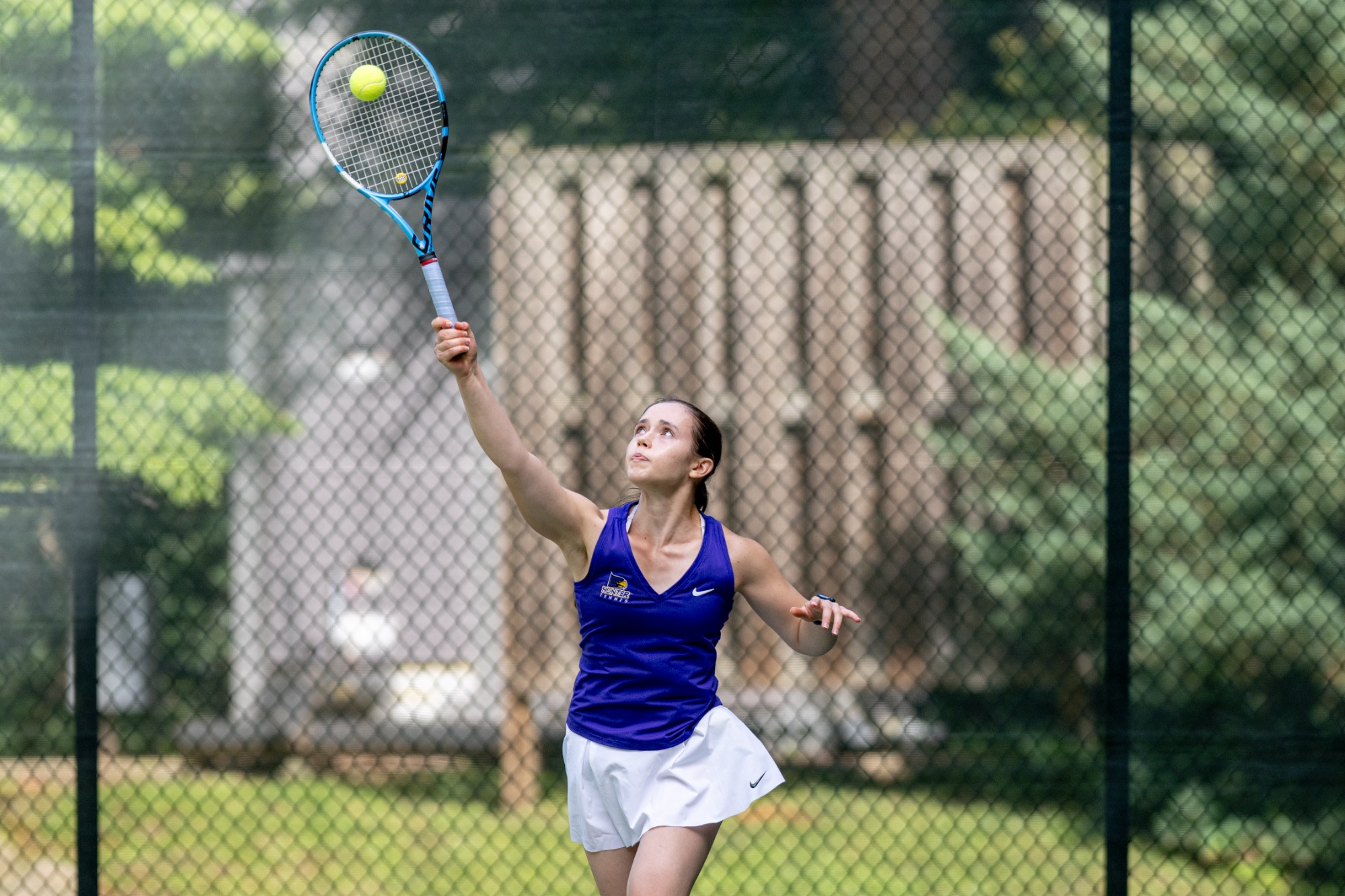 Julia Aksamentova competes for Hunter College women's tennis.