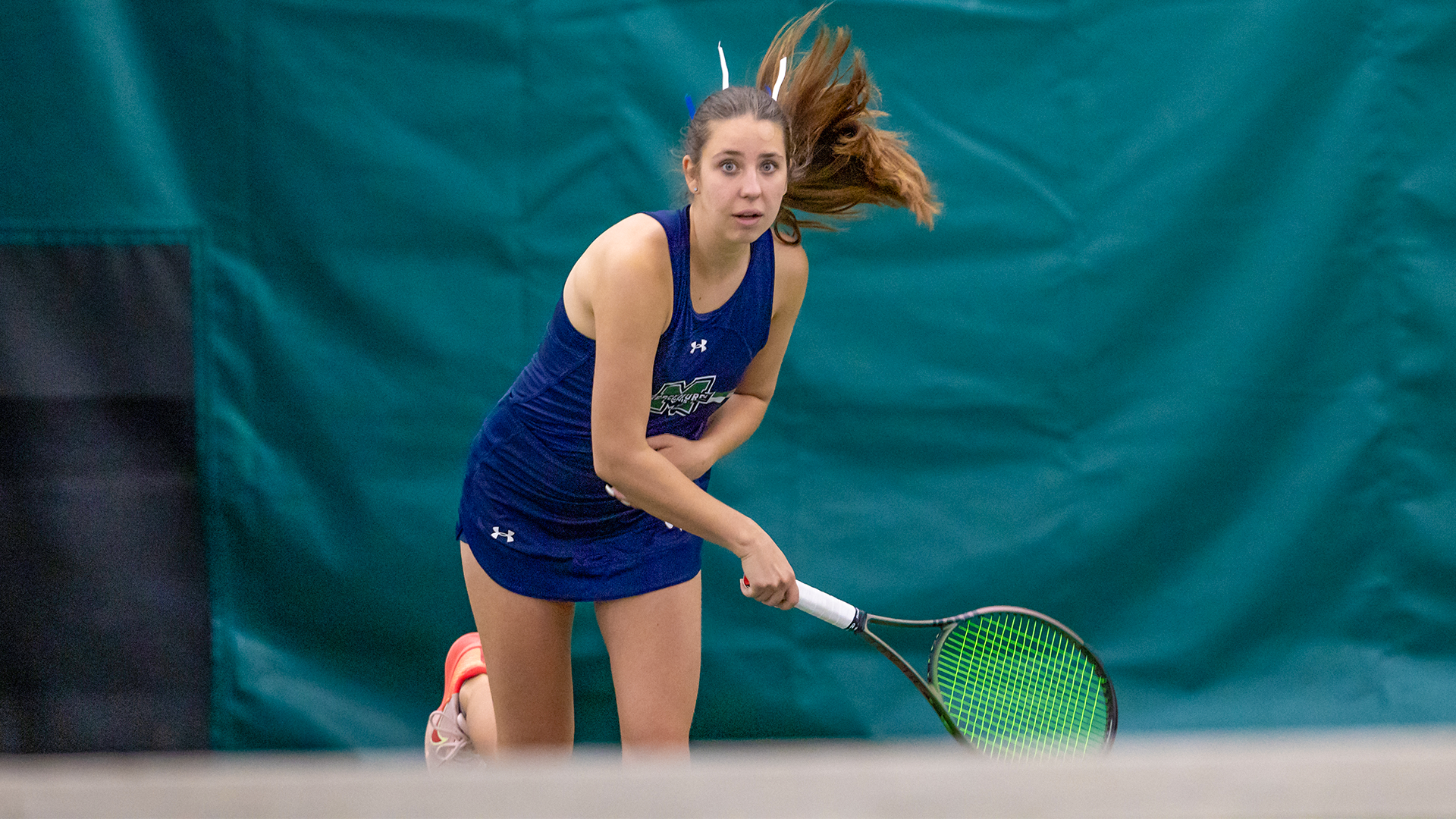 Rogova sends serve over net