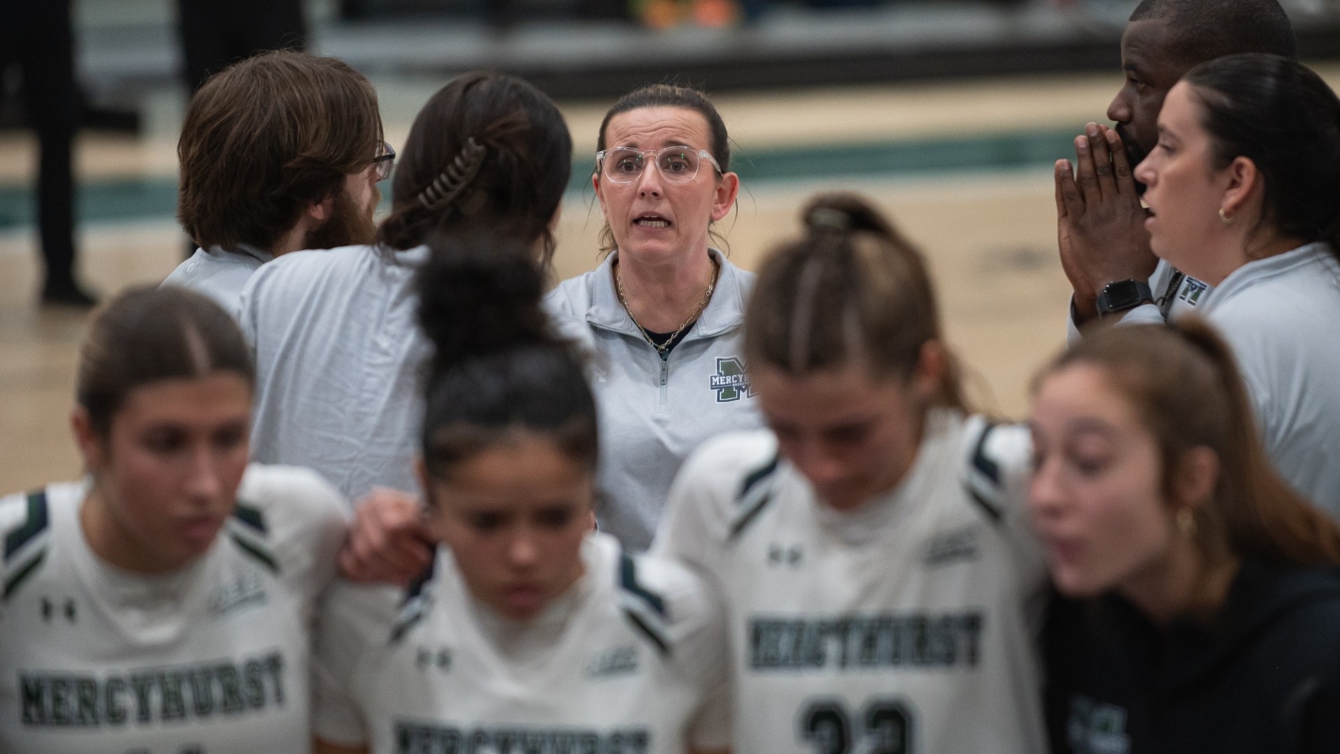 Coach Mills in Huddle