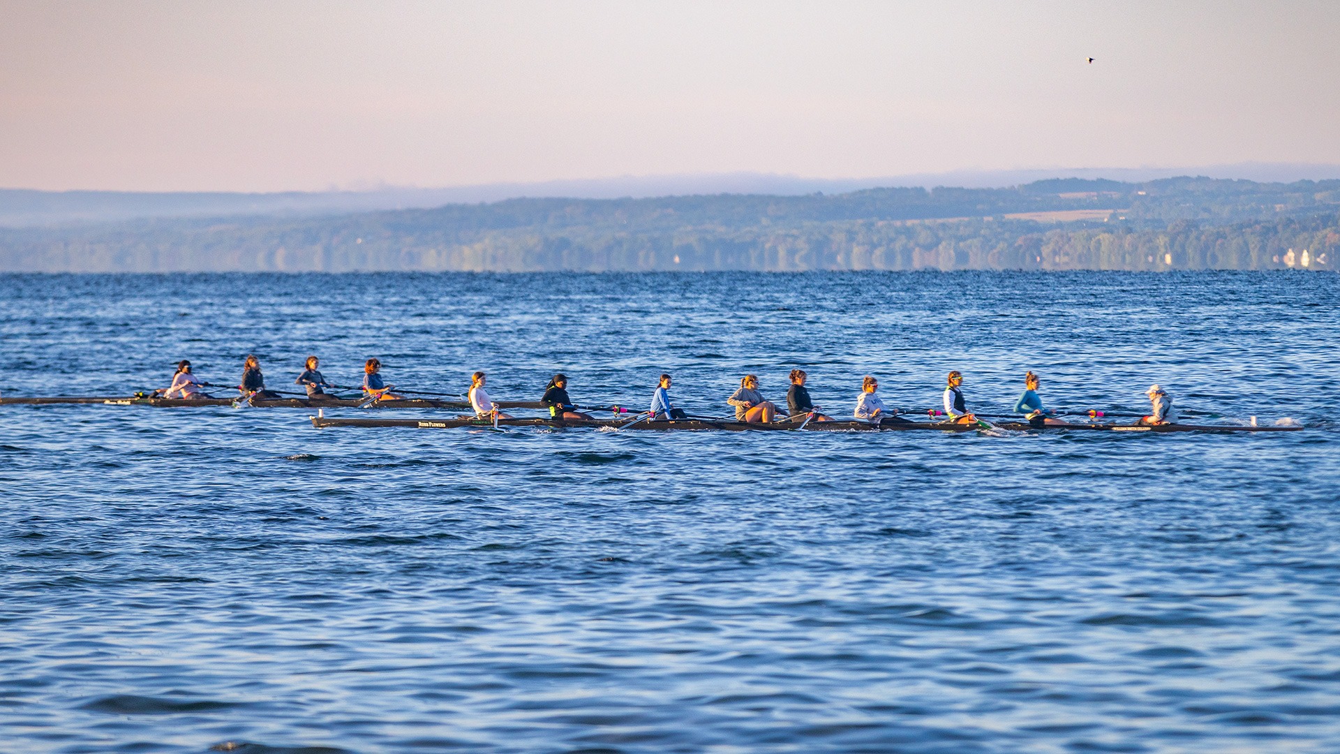 William Smith Rowing team practices on Seneca Lake