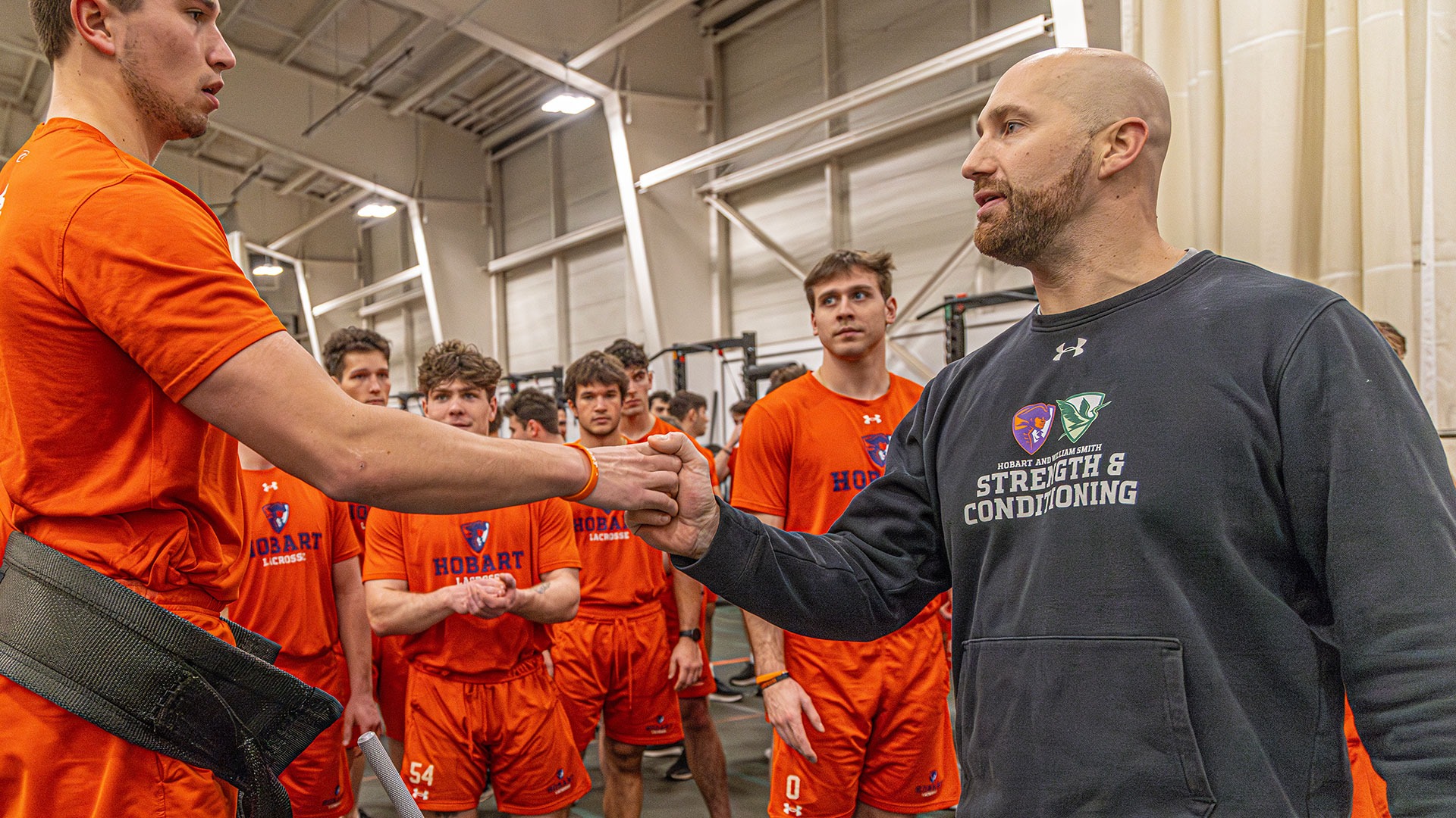 Chris Gray shakes hands with Will Corbett