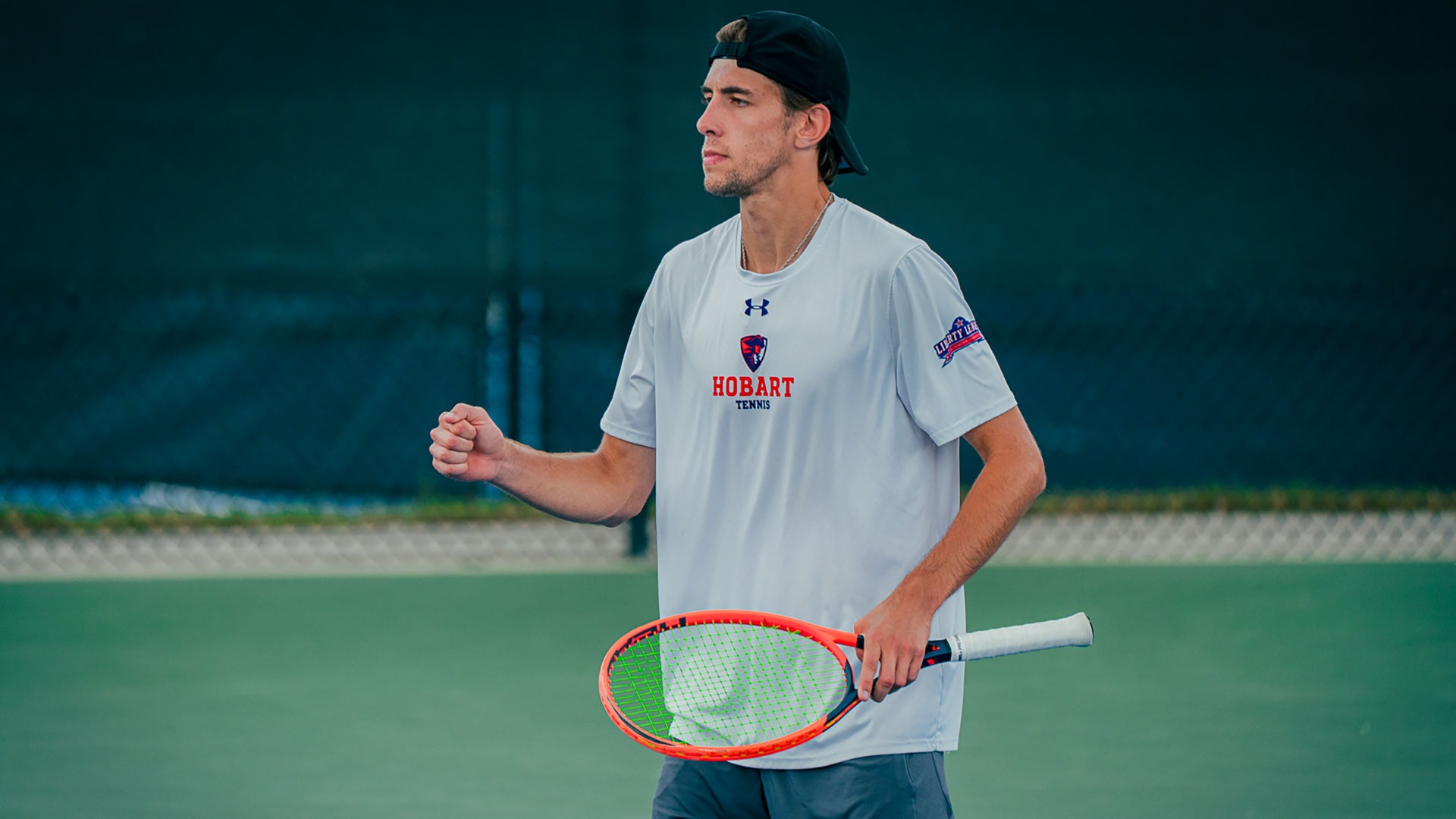 Nick Fischer celebrates point at ITA Cup