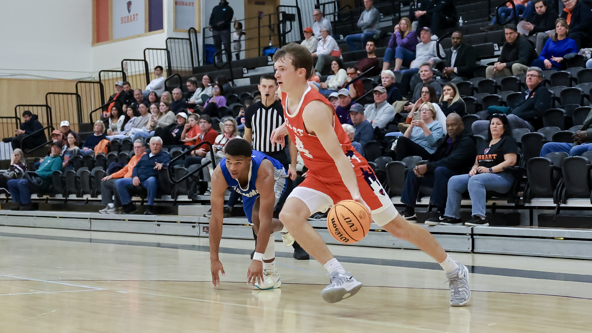 Alex Moesch Dribbles by a Defender