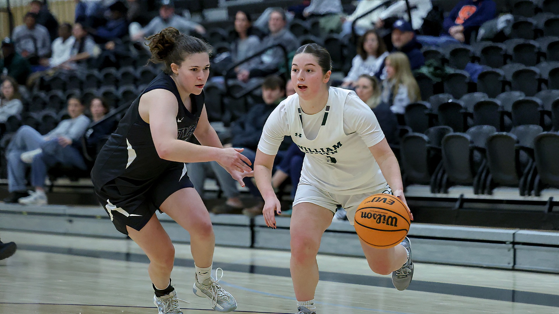 Carly Scott dribbles past defender