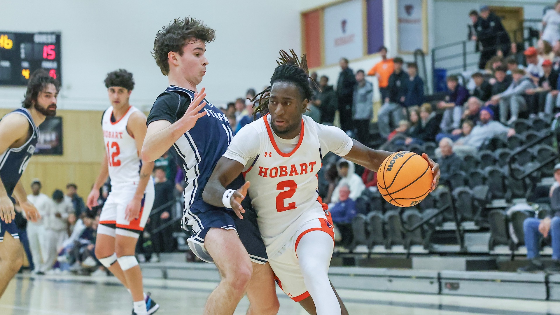 Monty Nedd drives past an Ithaca defender.