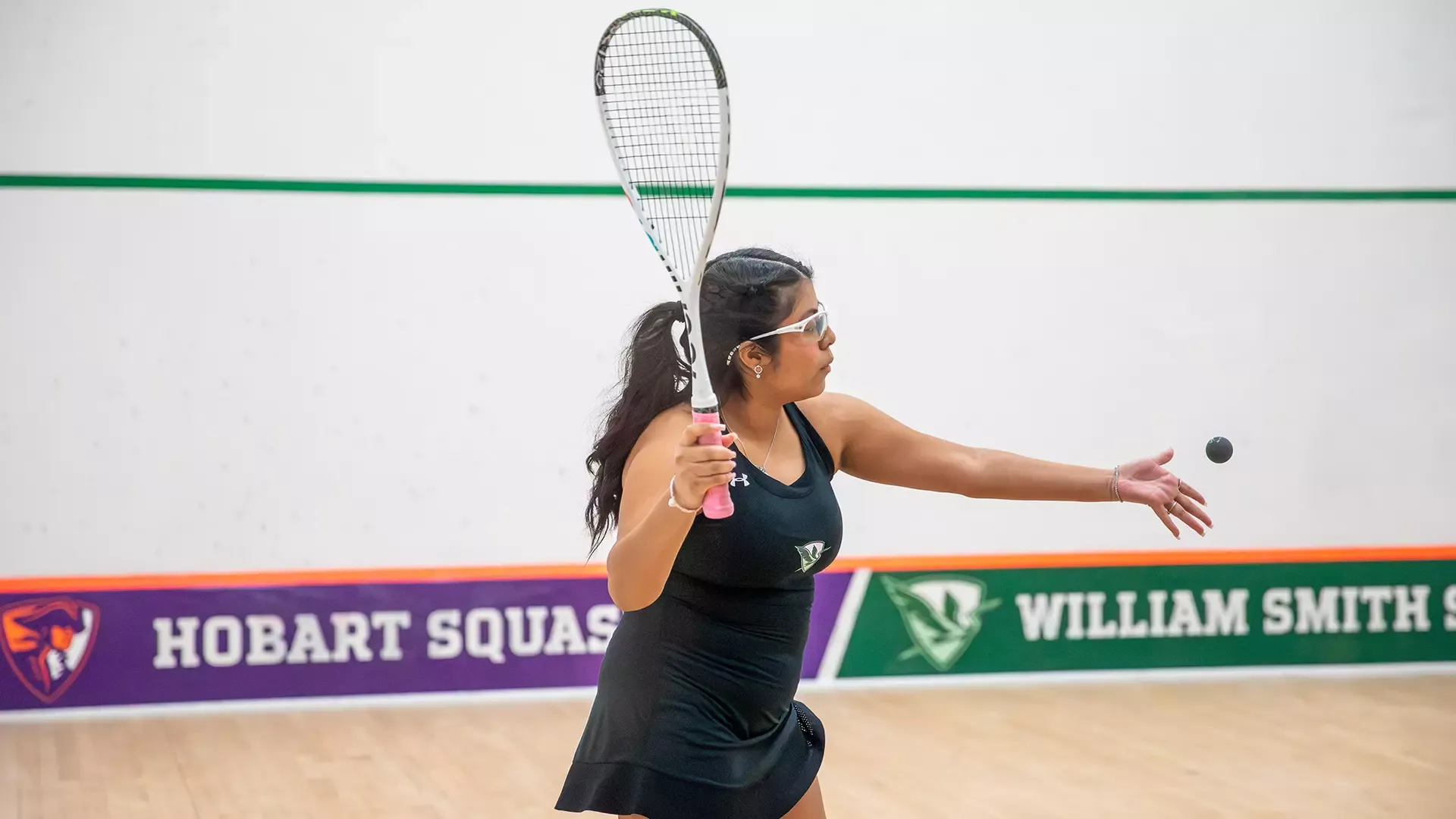 Kimberly Javier serving the ball