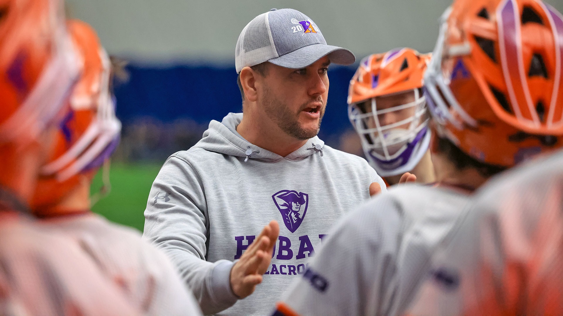 Stephen Brundage coaches the offense during a timeout in the Canisius game.